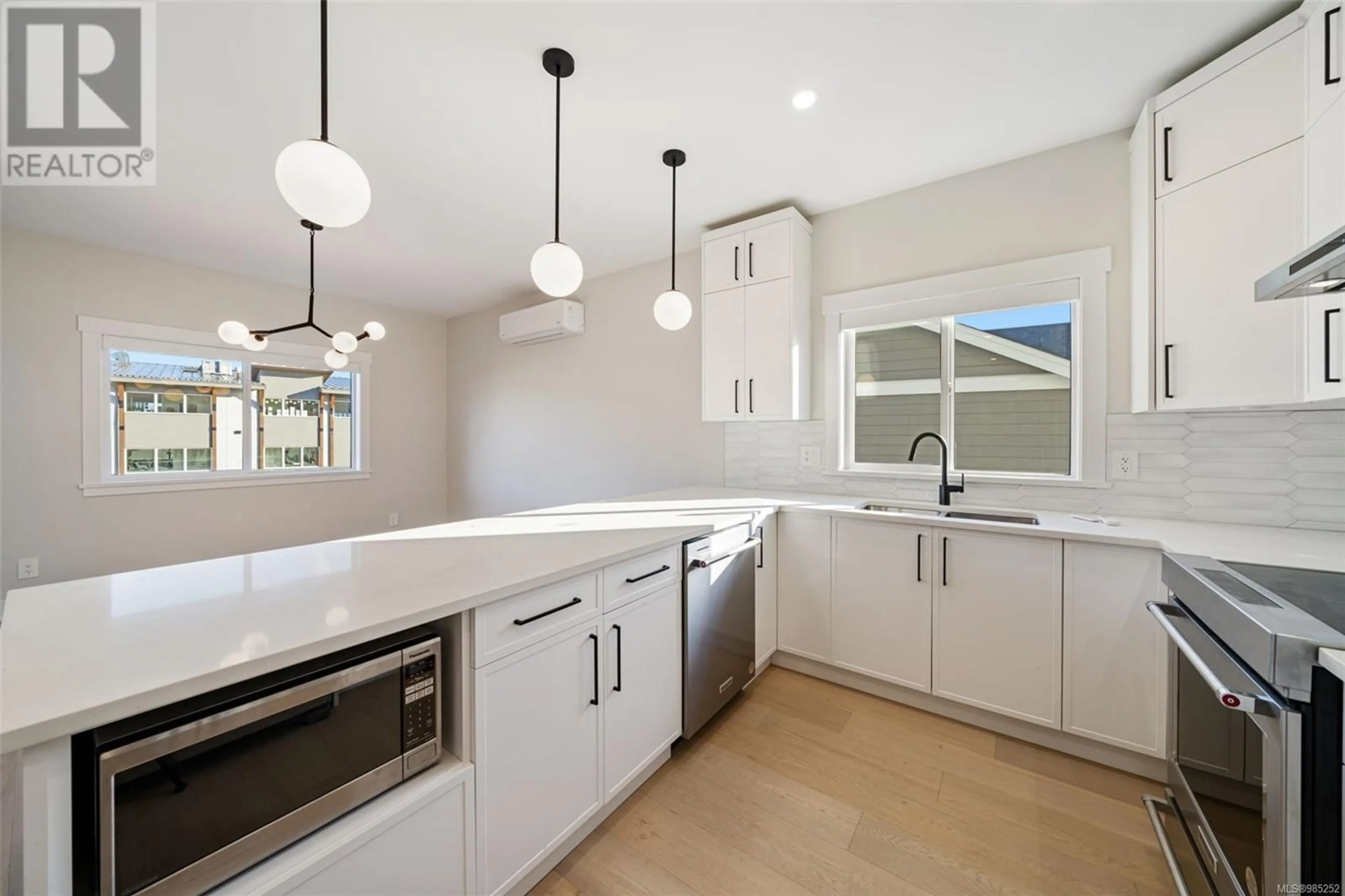 Open concept kitchen, ceramic/tile floor for 2632 Mica Pl, Langford British Columbia V9B5N1