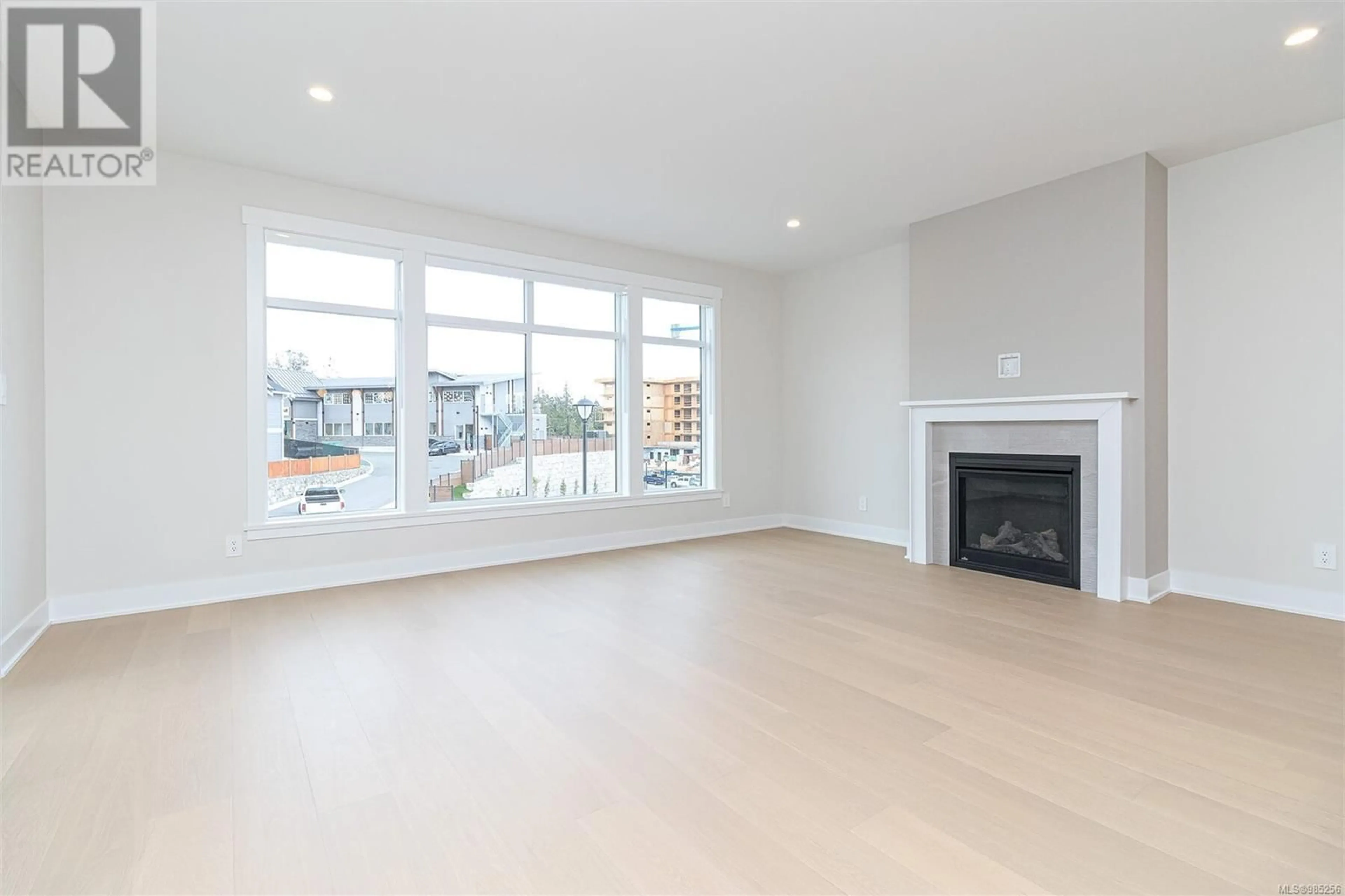 Living room with furniture, wood/laminate floor for 2621 Mica Pl, Langford British Columbia V9B5N1