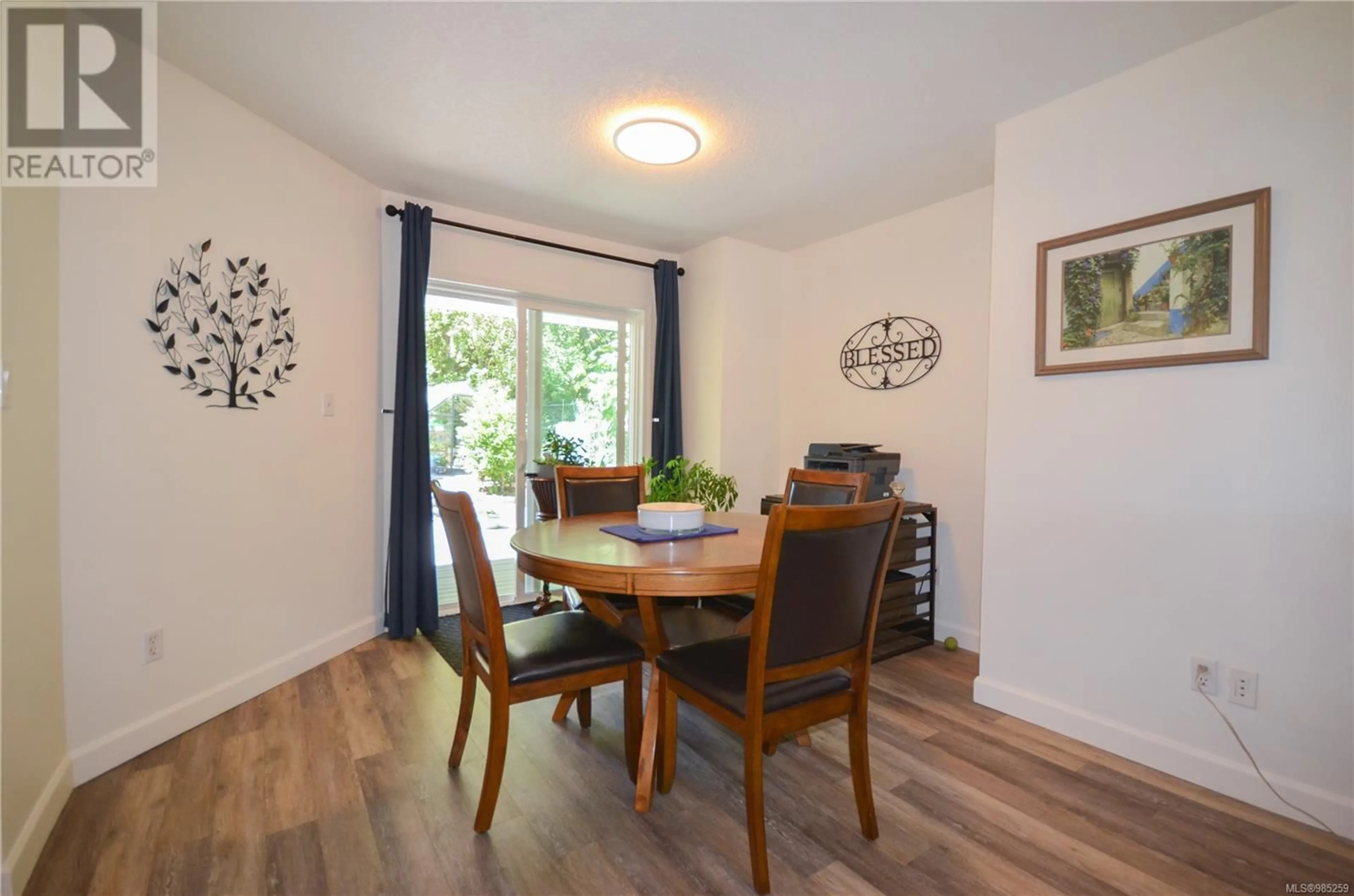 Dining room, wood/laminate floor for 3231 Greystone Pl, Nanaimo British Columbia V9T5S2