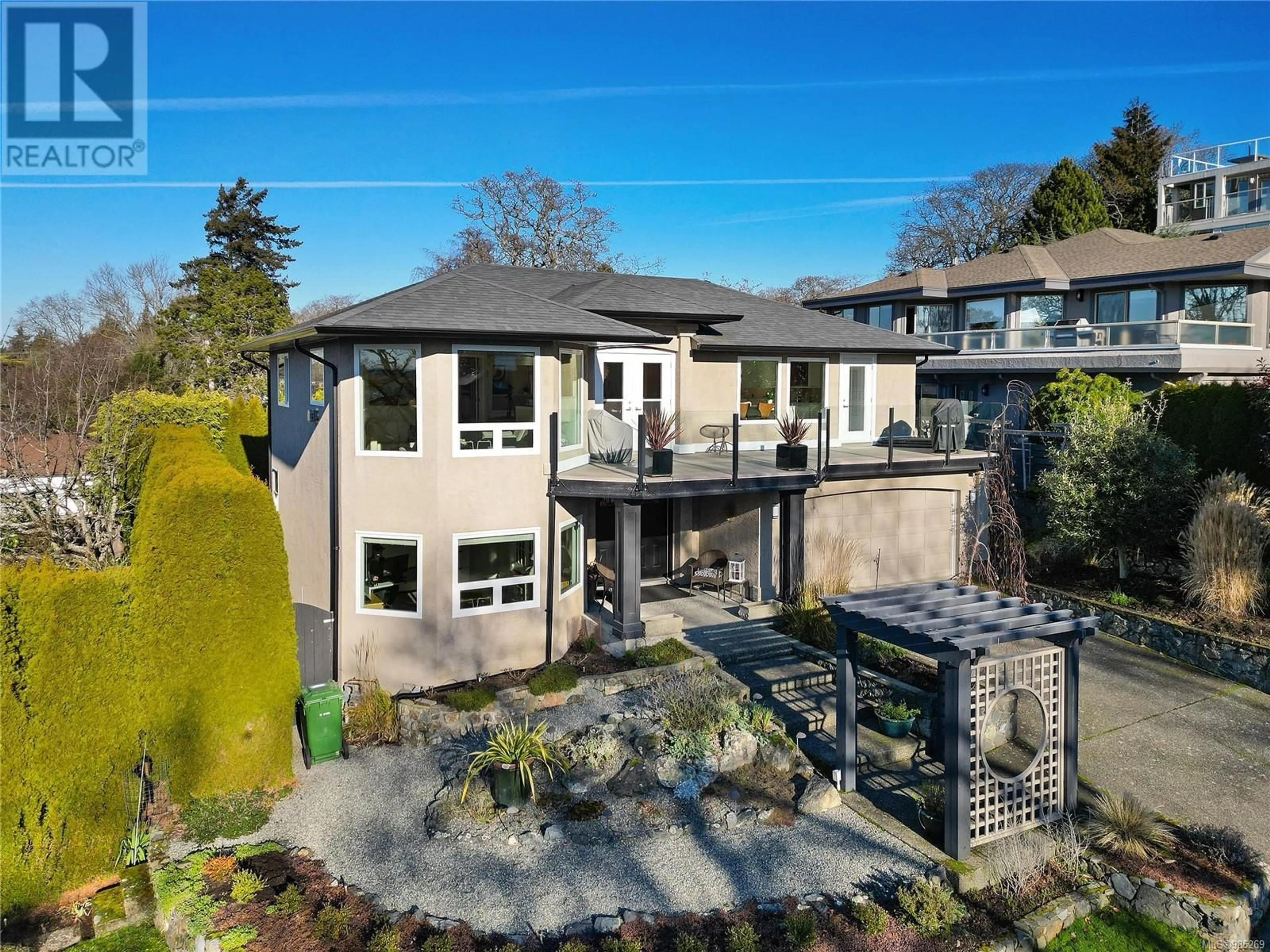 A pic from outside/outdoor area/front of a property/back of a property/a pic from drone, street for 1907 Quixote Lane, Victoria British Columbia V8S5L5