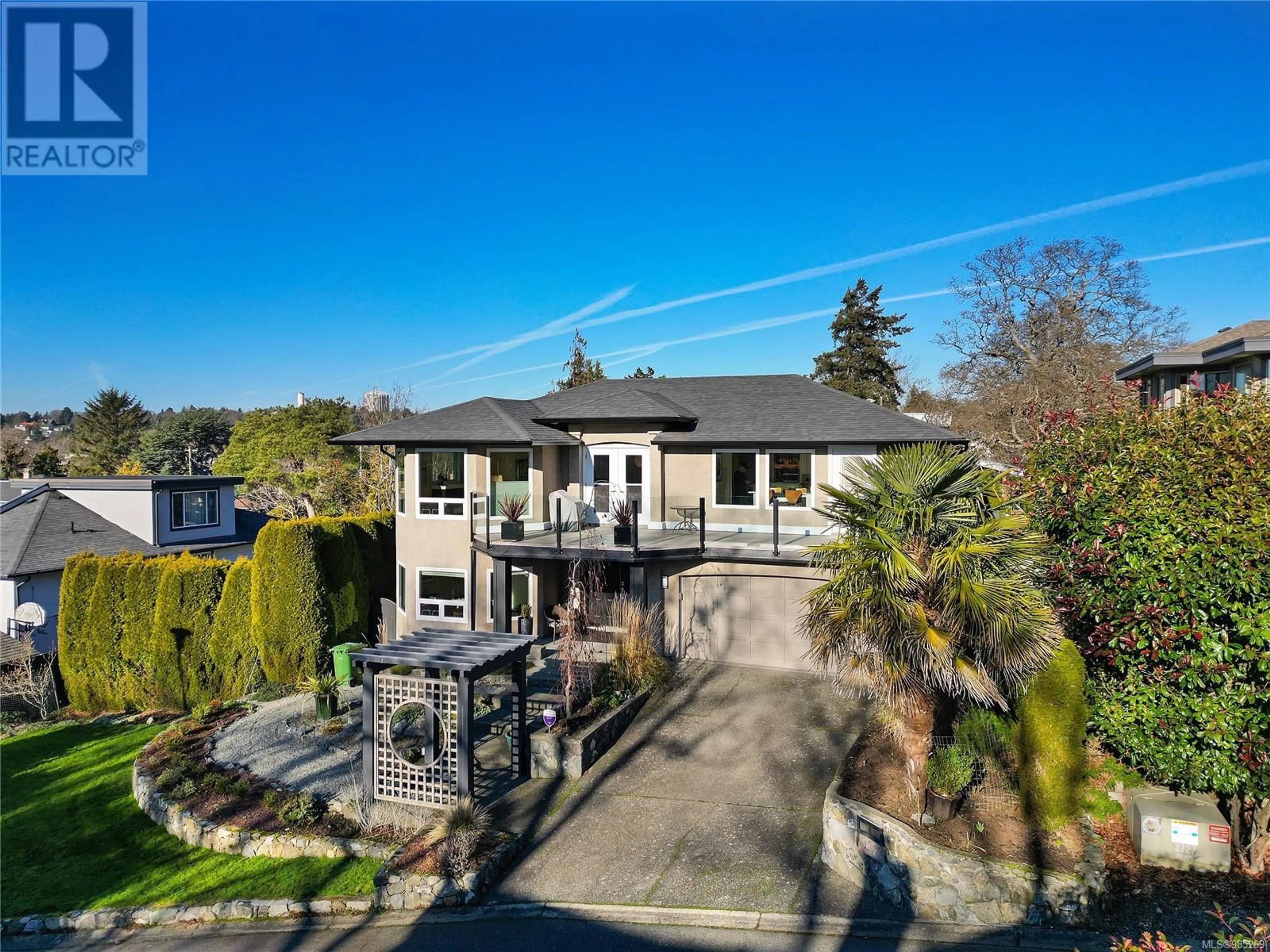 A pic from outside/outdoor area/front of a property/back of a property/a pic from drone, street for 1907 Quixote Lane, Victoria British Columbia V8S5L5