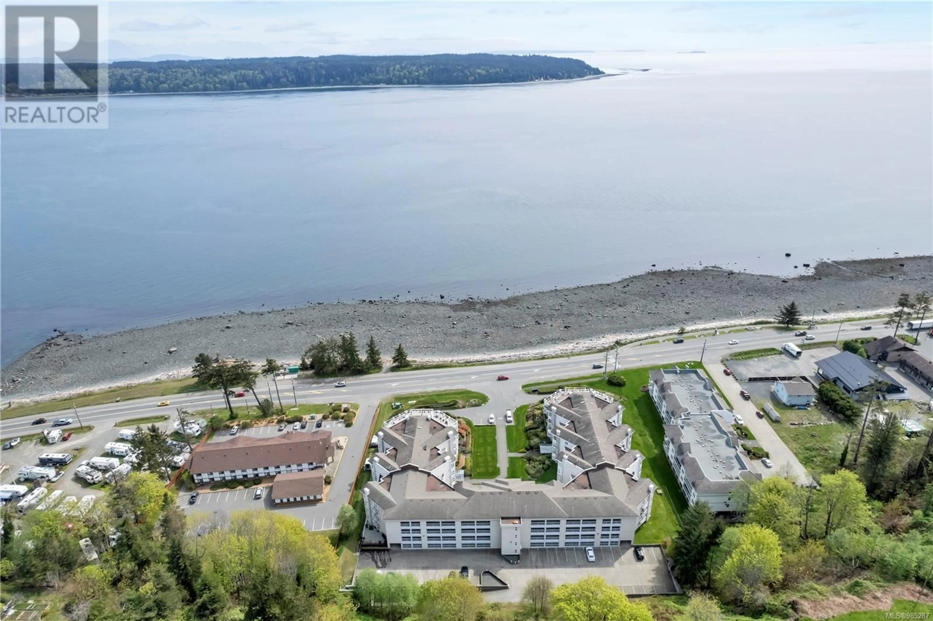 A pic from outside/outdoor area/front of a property/back of a property/a pic from drone, water/lake/river/ocean view for 410 350 Island Hwy S, Campbell River British Columbia V9W1A5