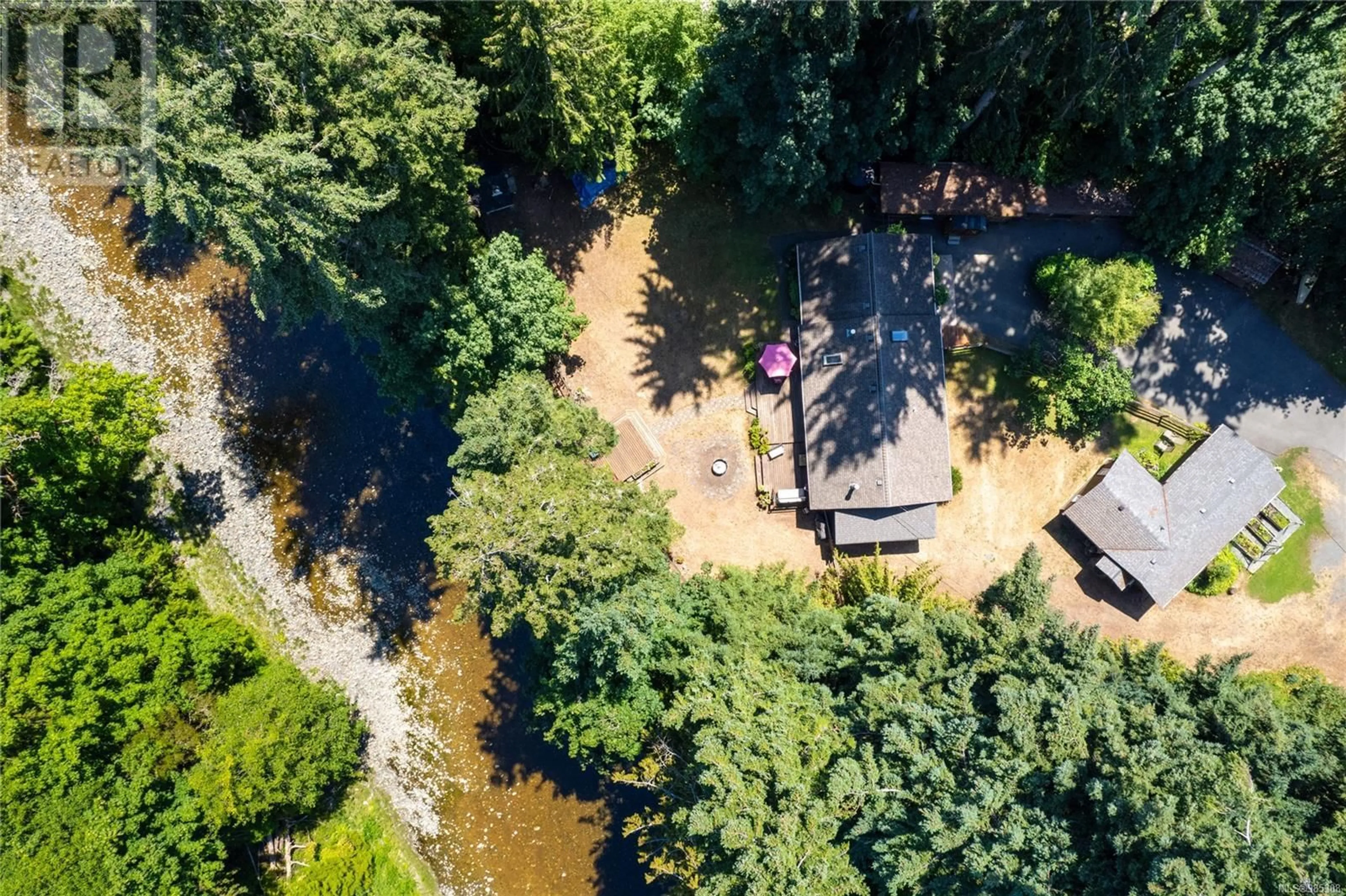 A pic from outside/outdoor area/front of a property/back of a property/a pic from drone, forest/trees view for 616 Martindale Rd, Parksville British Columbia V9P1R8