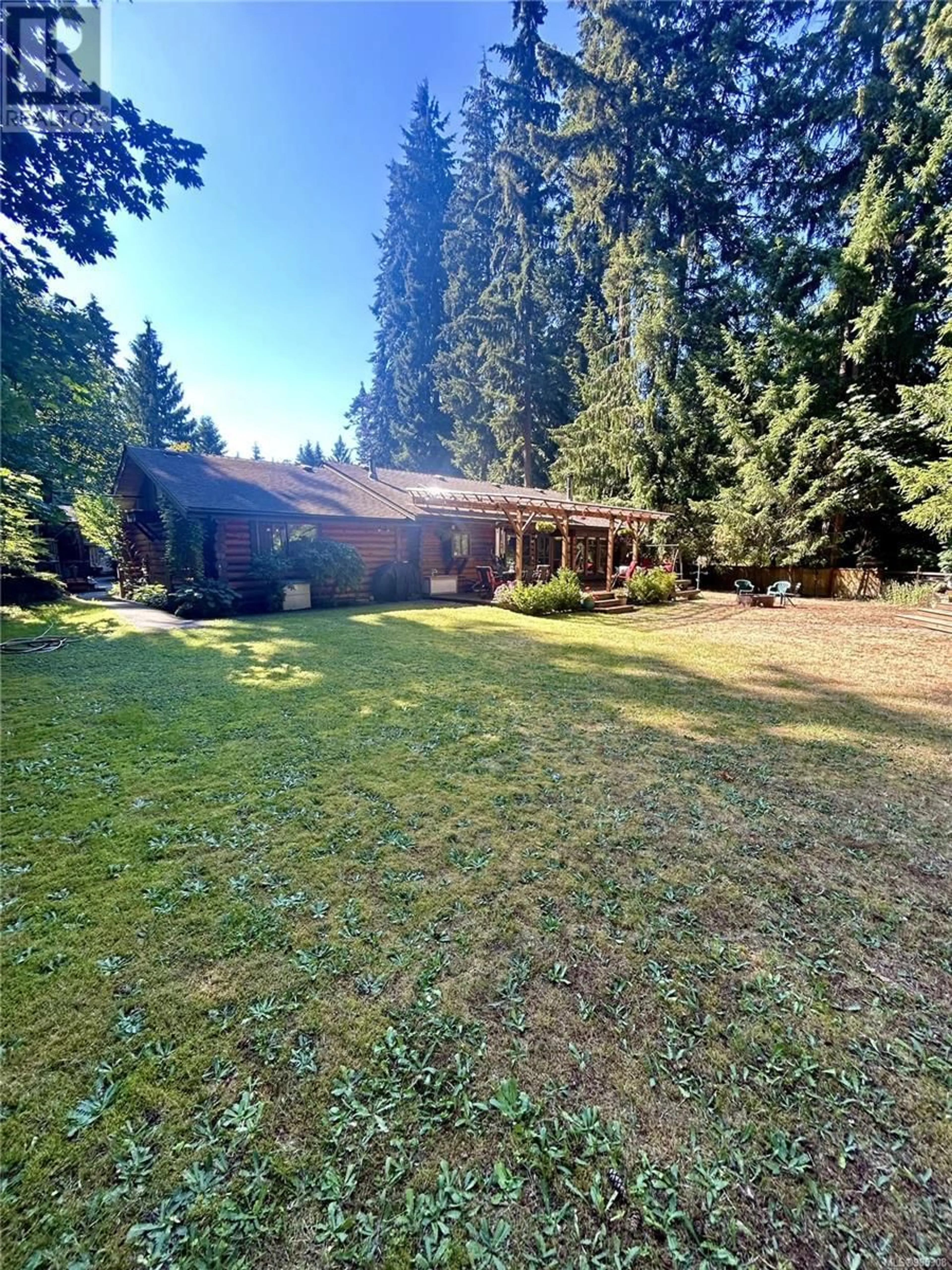 A pic from outside/outdoor area/front of a property/back of a property/a pic from drone, forest/trees view for 616 Martindale Rd, Parksville British Columbia V9P1R8