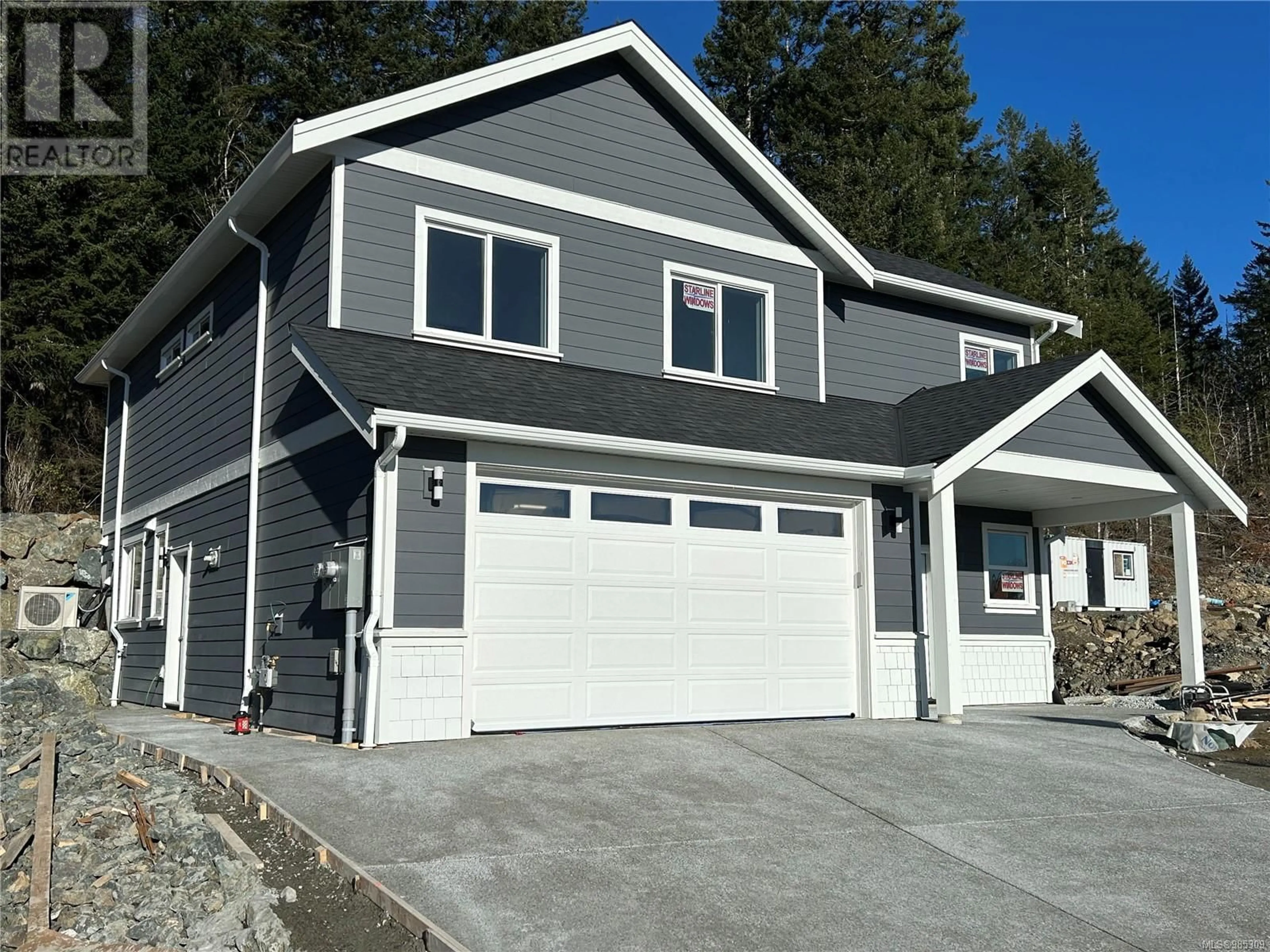 Home with vinyl exterior material, street for 2588 Nickson Way, Sooke British Columbia V9Z1P8