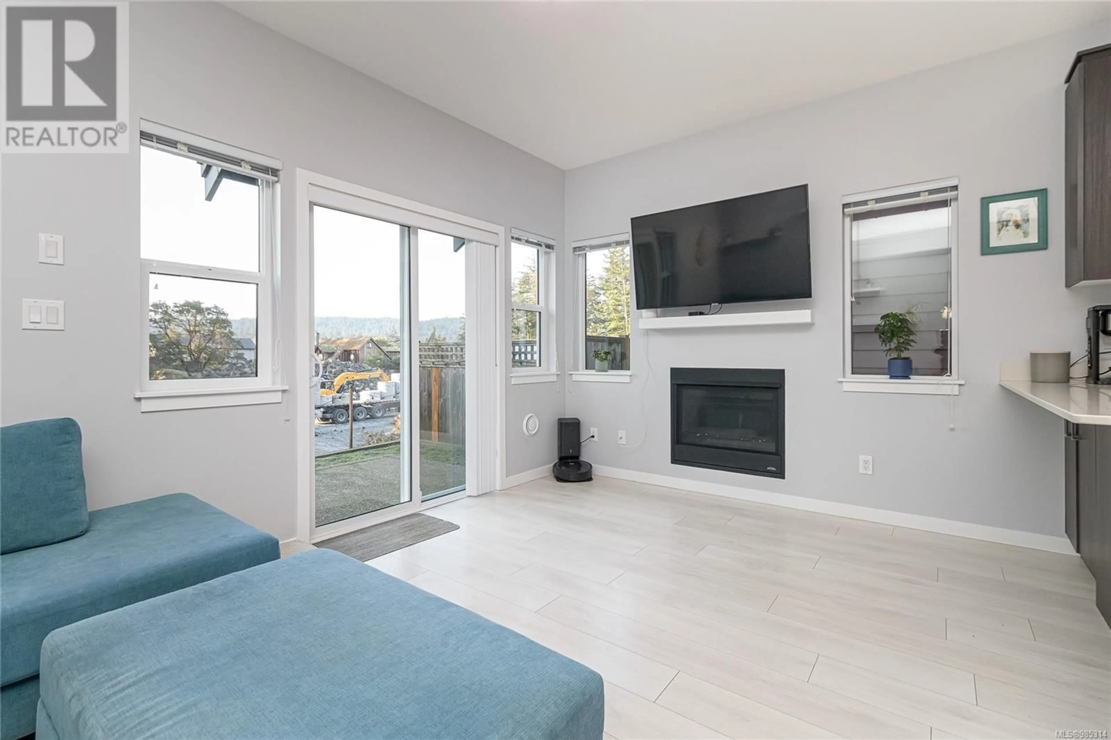 Living room with furniture, ceramic/tile floor for 905 Fulmar Rise, Langford British Columbia V9C0J9