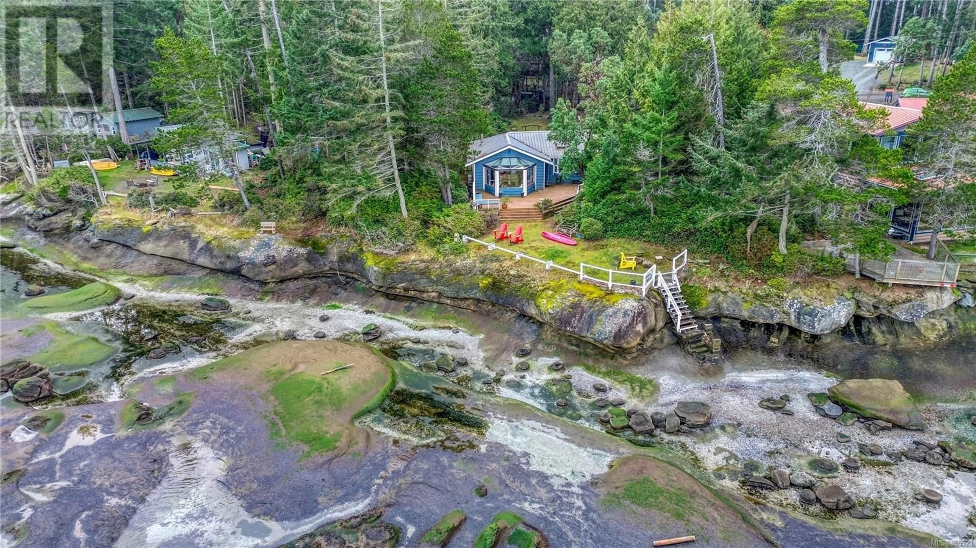 A pic from outside/outdoor area/front of a property/back of a property/a pic from drone, water/lake/river/ocean view for 51 Malaspina Dr, Gabriola Island British Columbia V0R1X1