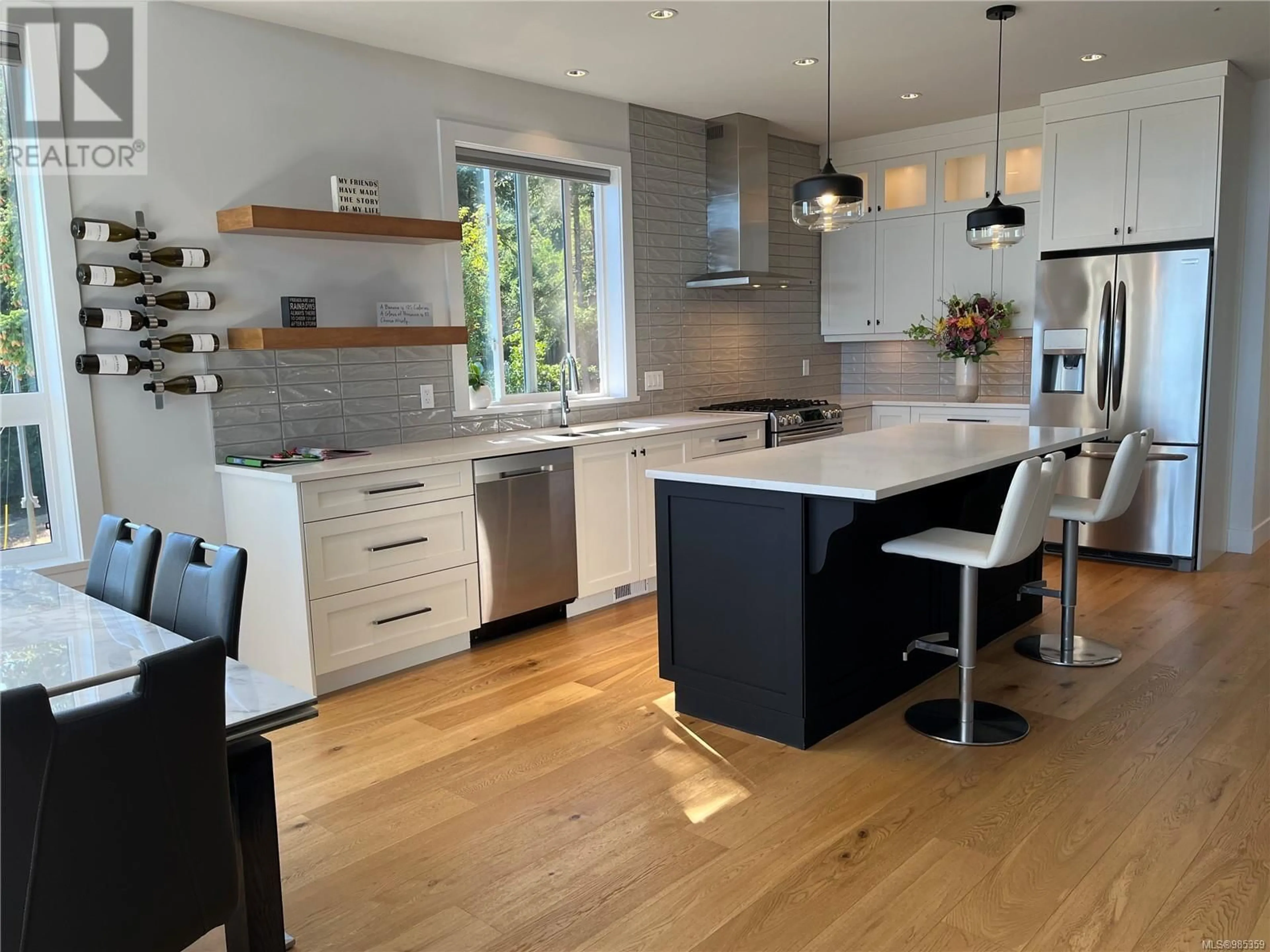 Contemporary kitchen, wood/laminate floor for 533 Gurunank Lane, Colwood British Columbia V9C0M2