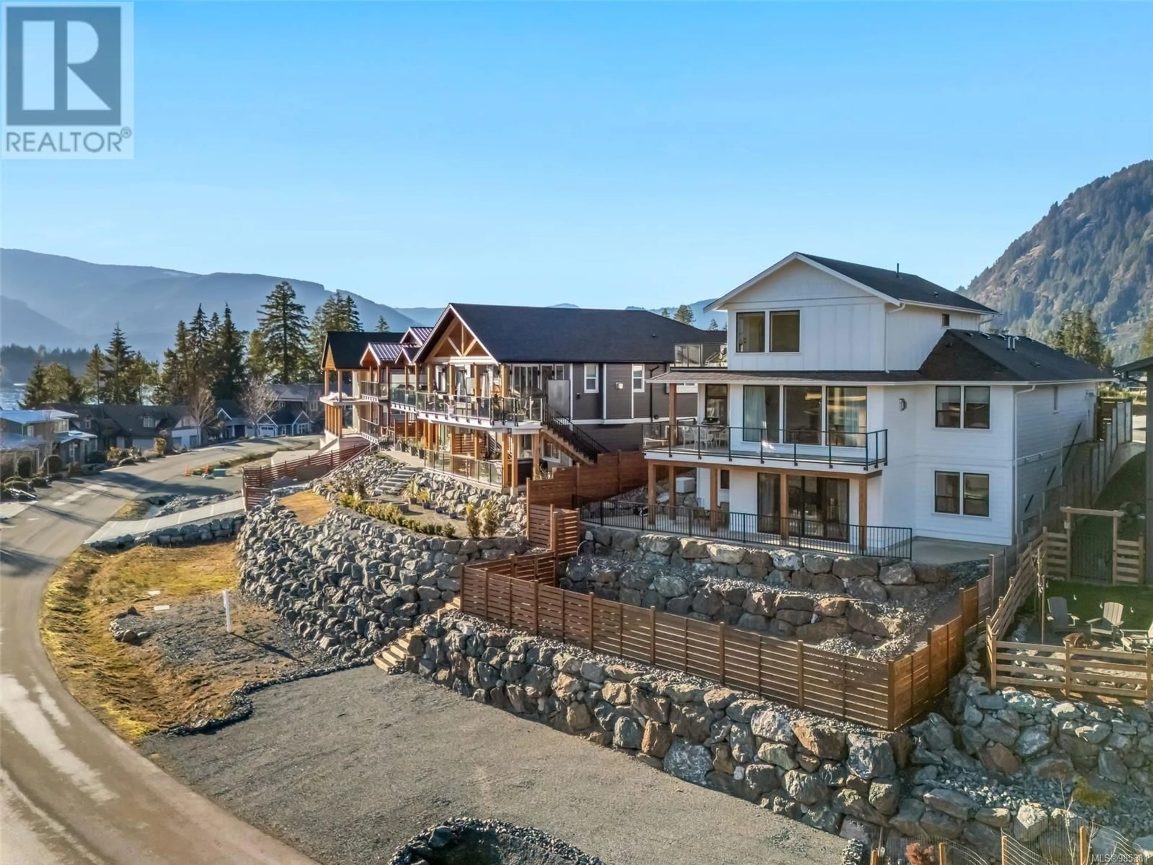 A pic from outside/outdoor area/front of a property/back of a property/a pic from drone, mountain view for 9386 LAKEFRONT RISE, Lake Cowichan British Columbia V0R2G1