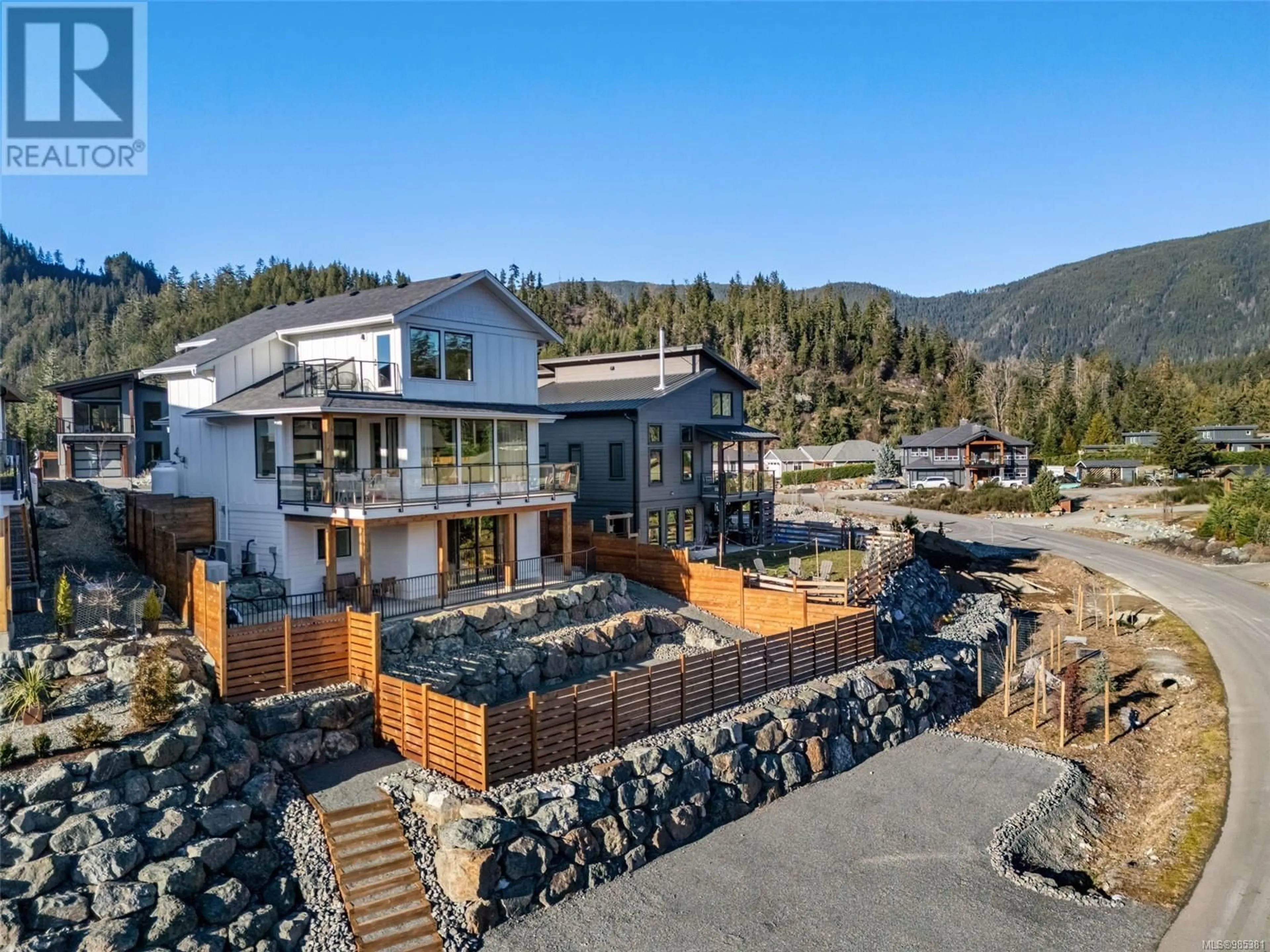 A pic from outside/outdoor area/front of a property/back of a property/a pic from drone, mountain view for 9386 LAKEFRONT RISE, Lake Cowichan British Columbia V0R2G1