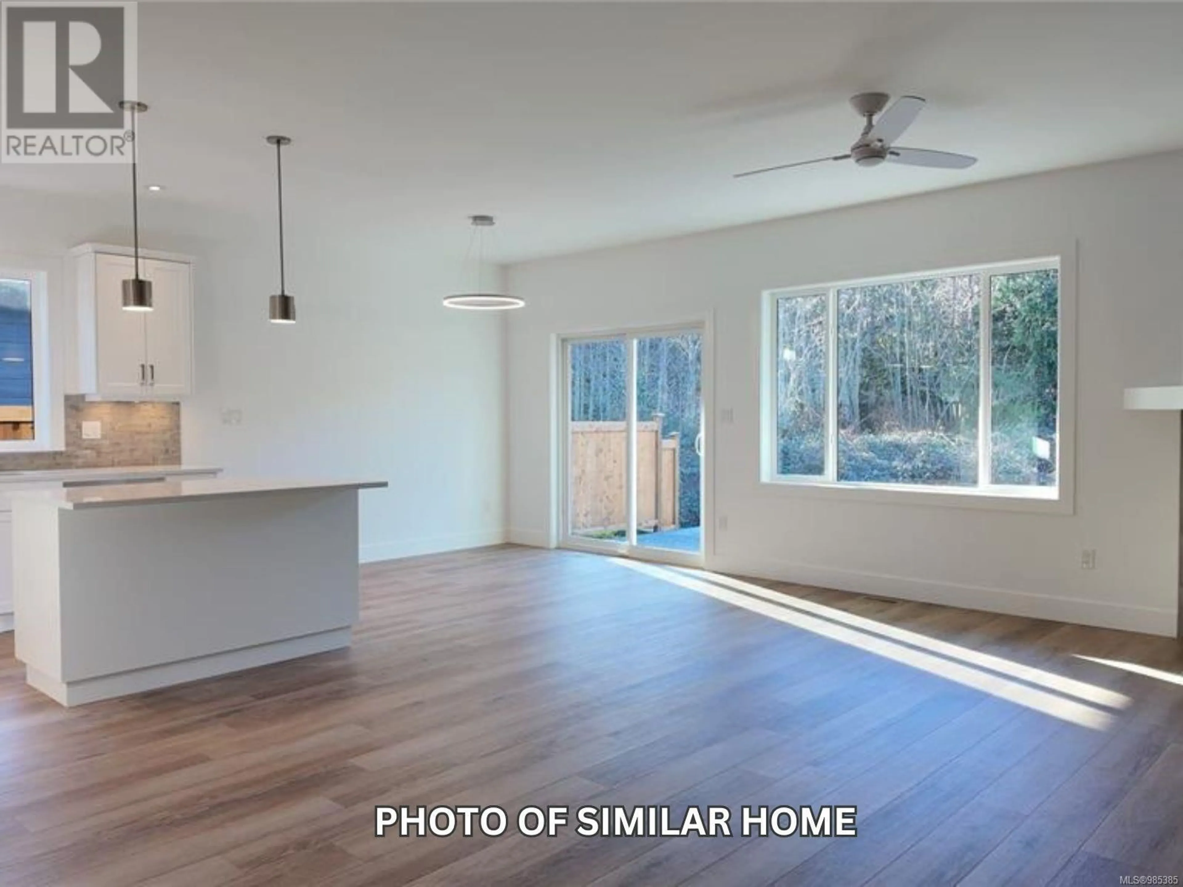 Open concept kitchen, wood/laminate floor for 3054 Abbott Pl, Chemainus British Columbia V9L3X1