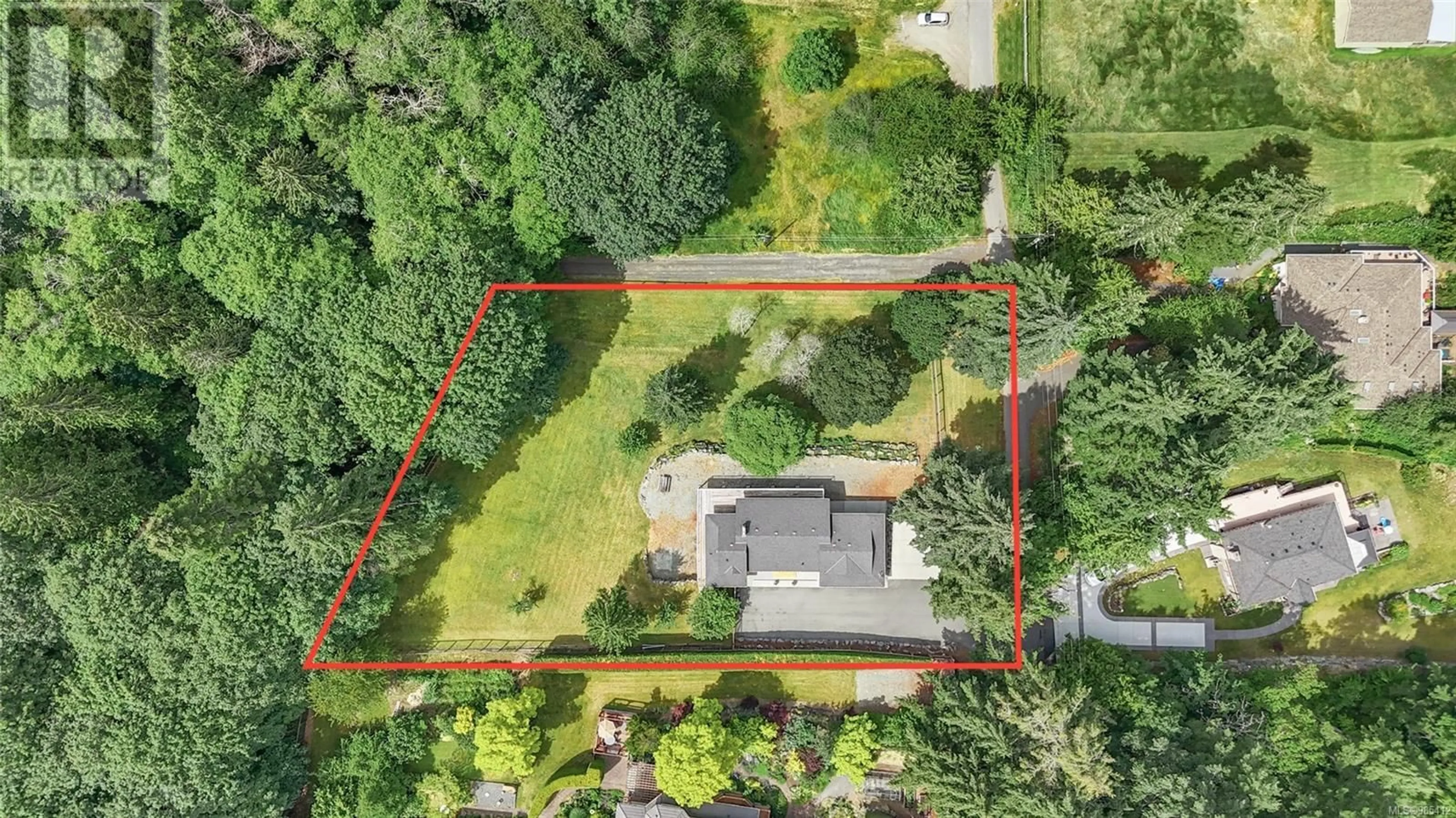 A pic from outside/outdoor area/front of a property/back of a property/a pic from drone, street for 1751 Cultra Ave, Central Saanich British Columbia V8M1T1