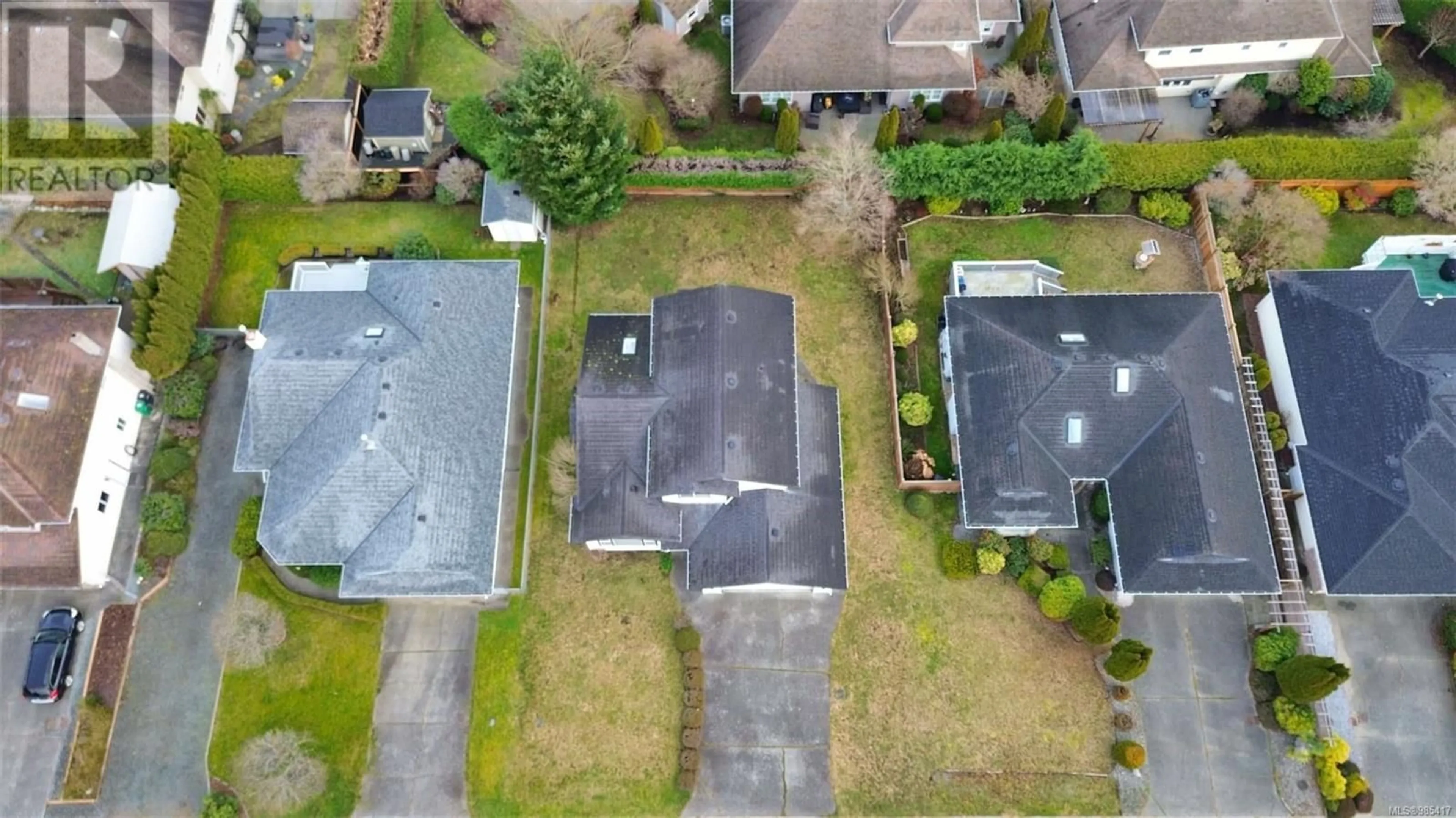 A pic from outside/outdoor area/front of a property/back of a property/a pic from drone, street for 6018 Sunset Rd, Nanaimo British Columbia V9V1K2