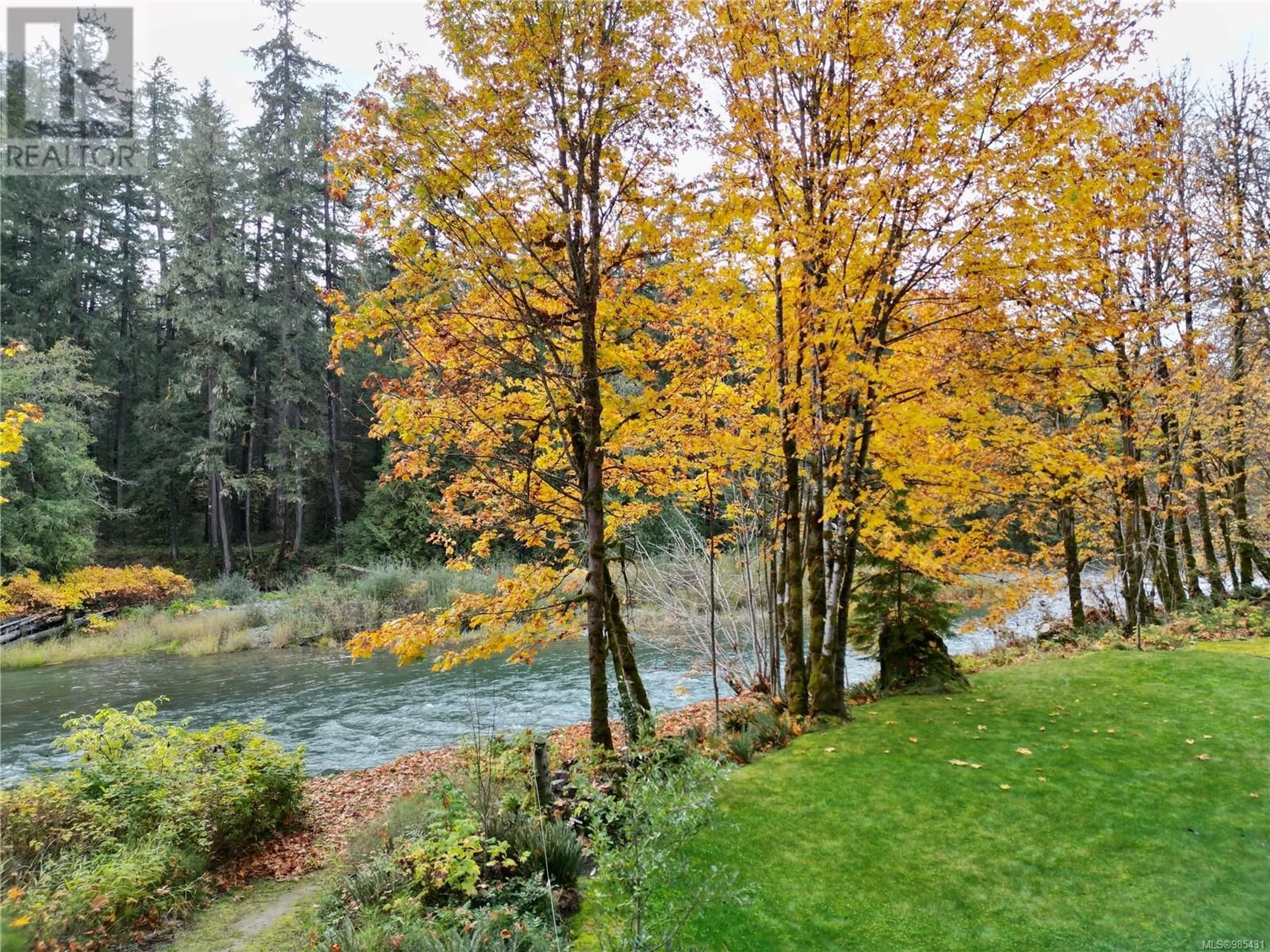 A pic from outside/outdoor area/front of a property/back of a property/a pic from drone, water/lake/river/ocean view for 6049 Riverbottom Rd W, Duncan British Columbia V9L6H7