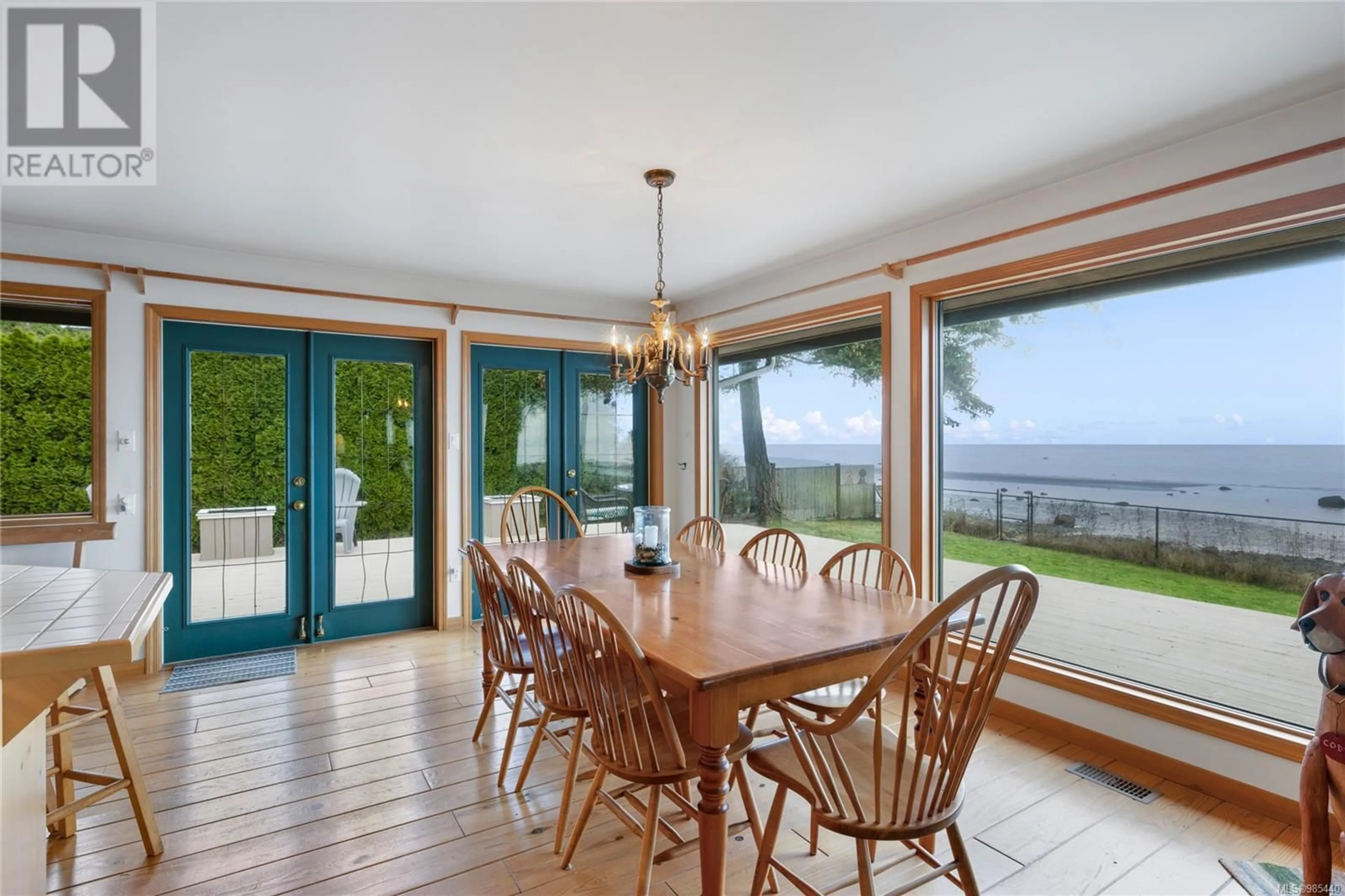 Dining room, wood/laminate floor for 1169 Butterball Dr, Qualicum Beach British Columbia V9K1C7