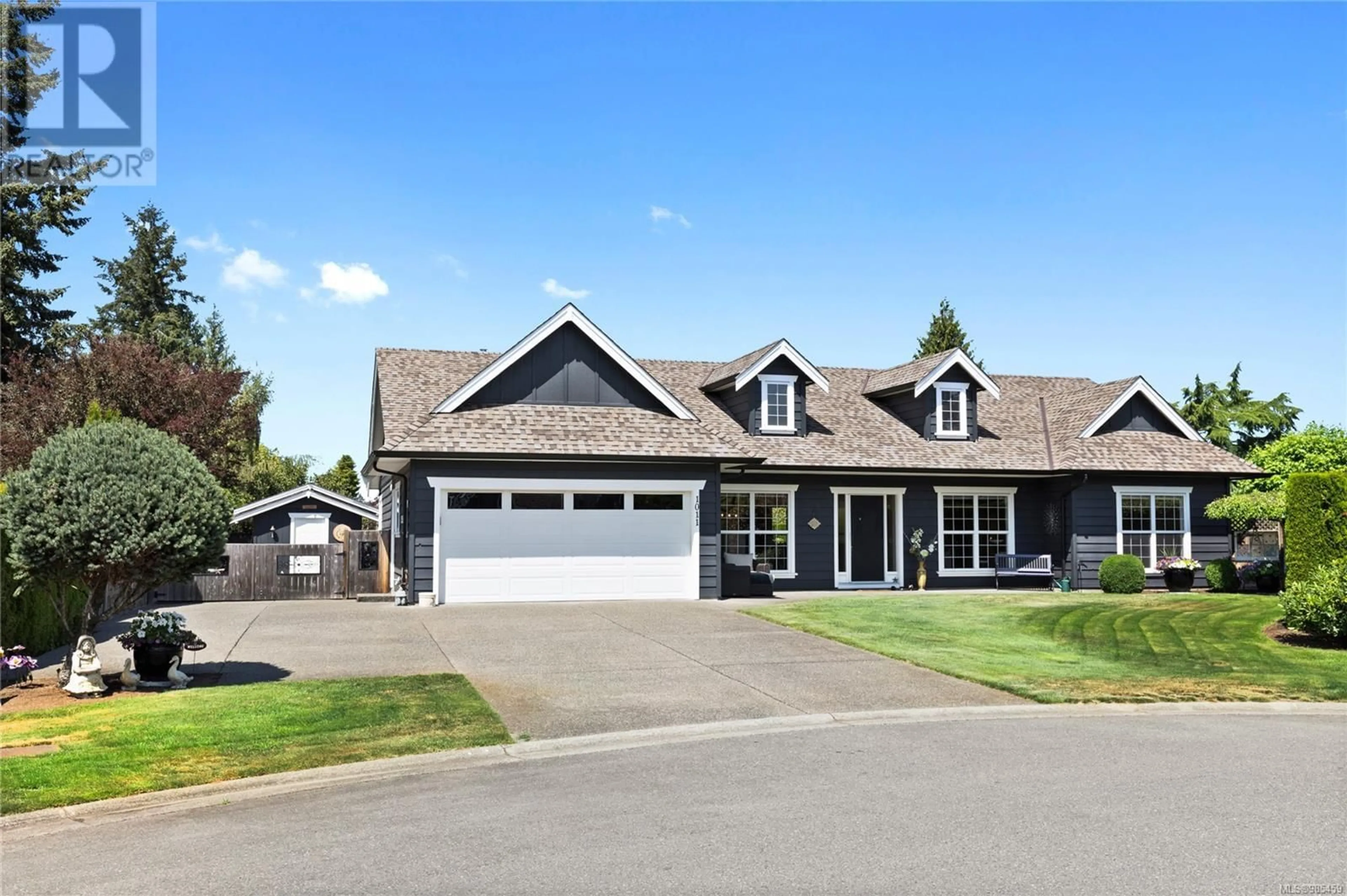 Home with vinyl exterior material, street for 1011 Heritage Crt, Qualicum Beach British Columbia V9K2P1