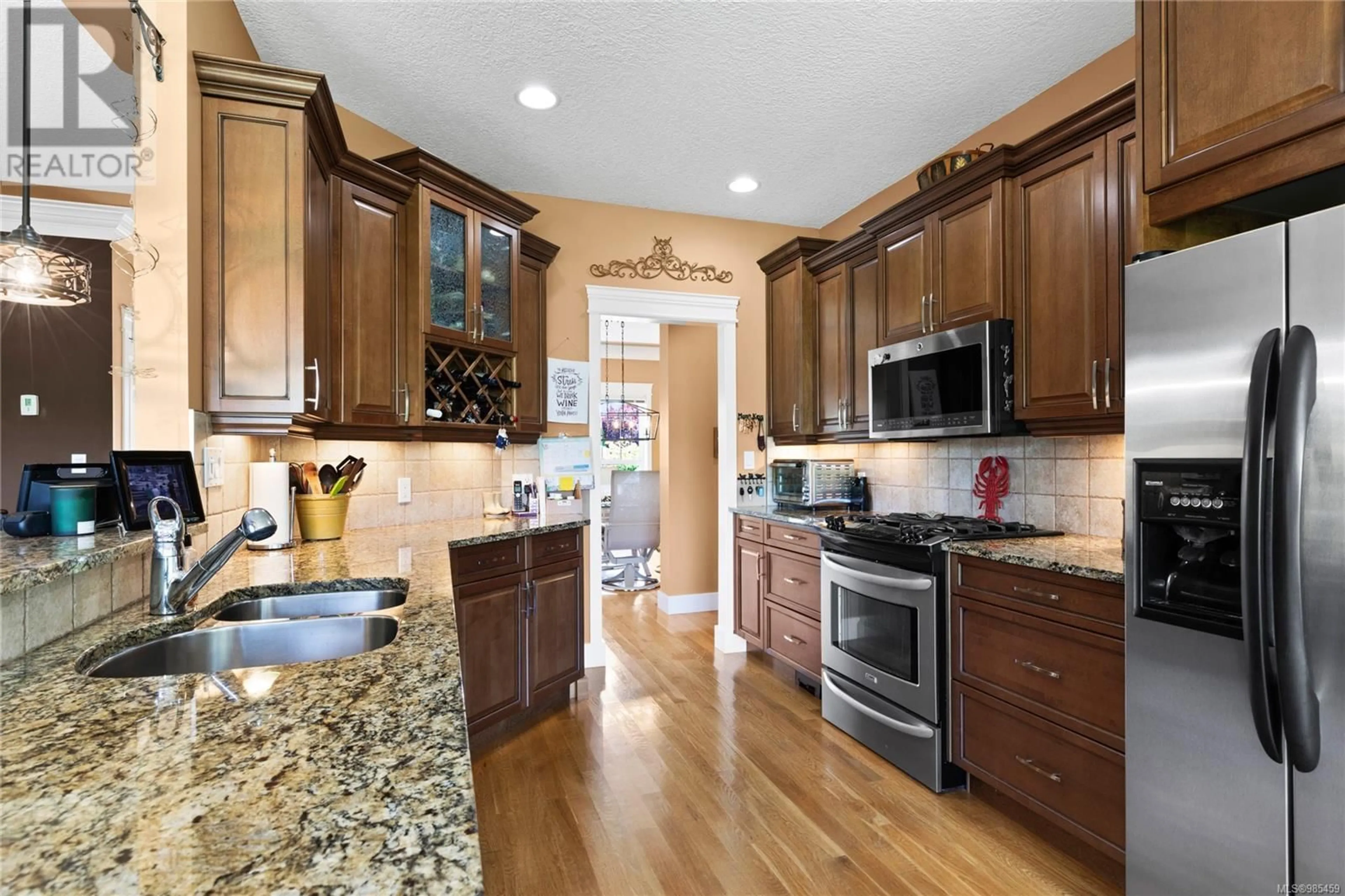 Open concept kitchen, ceramic/tile floor for 1011 Heritage Crt, Qualicum Beach British Columbia V9K2P1