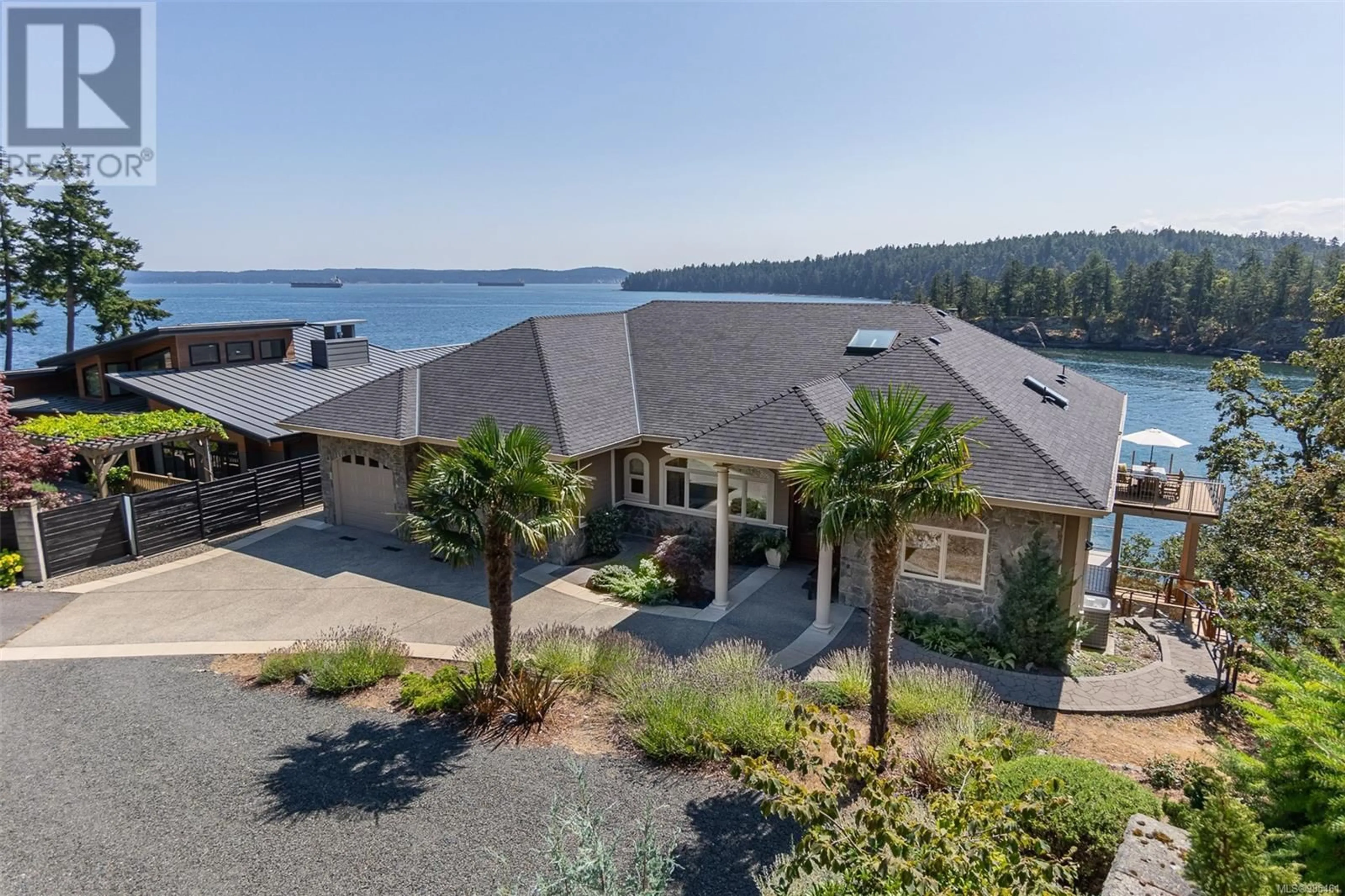 A pic from outside/outdoor area/front of a property/back of a property/a pic from drone, water/lake/river/ocean view for 3340 Stephenson Point Rd, Nanaimo British Columbia V9T1K2