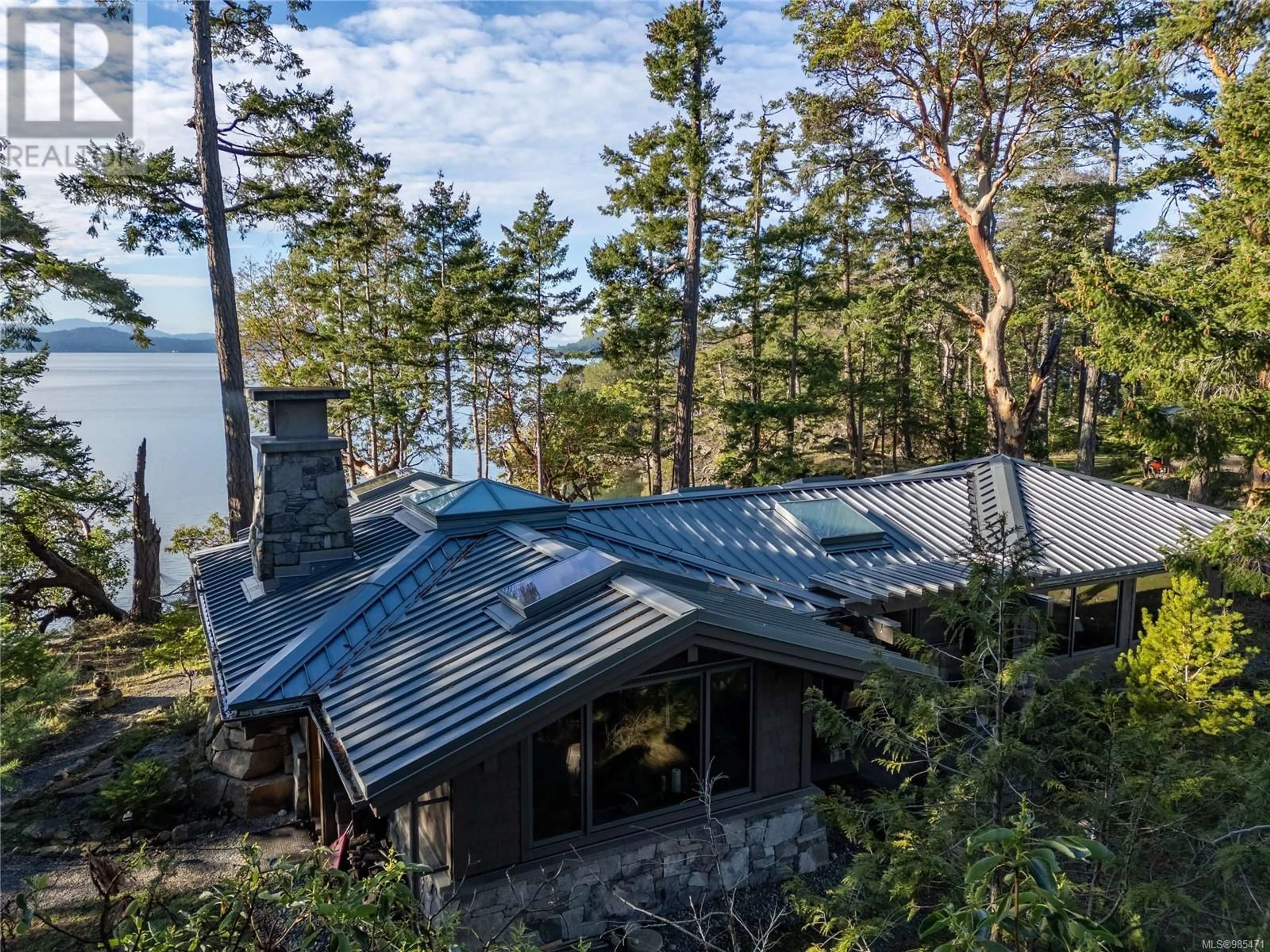 A pic from outside/outdoor area/front of a property/back of a property/a pic from drone, water/lake/river/ocean view for 105 CHURCH BAY ROAD, Saturna Island British Columbia V0N2Y0