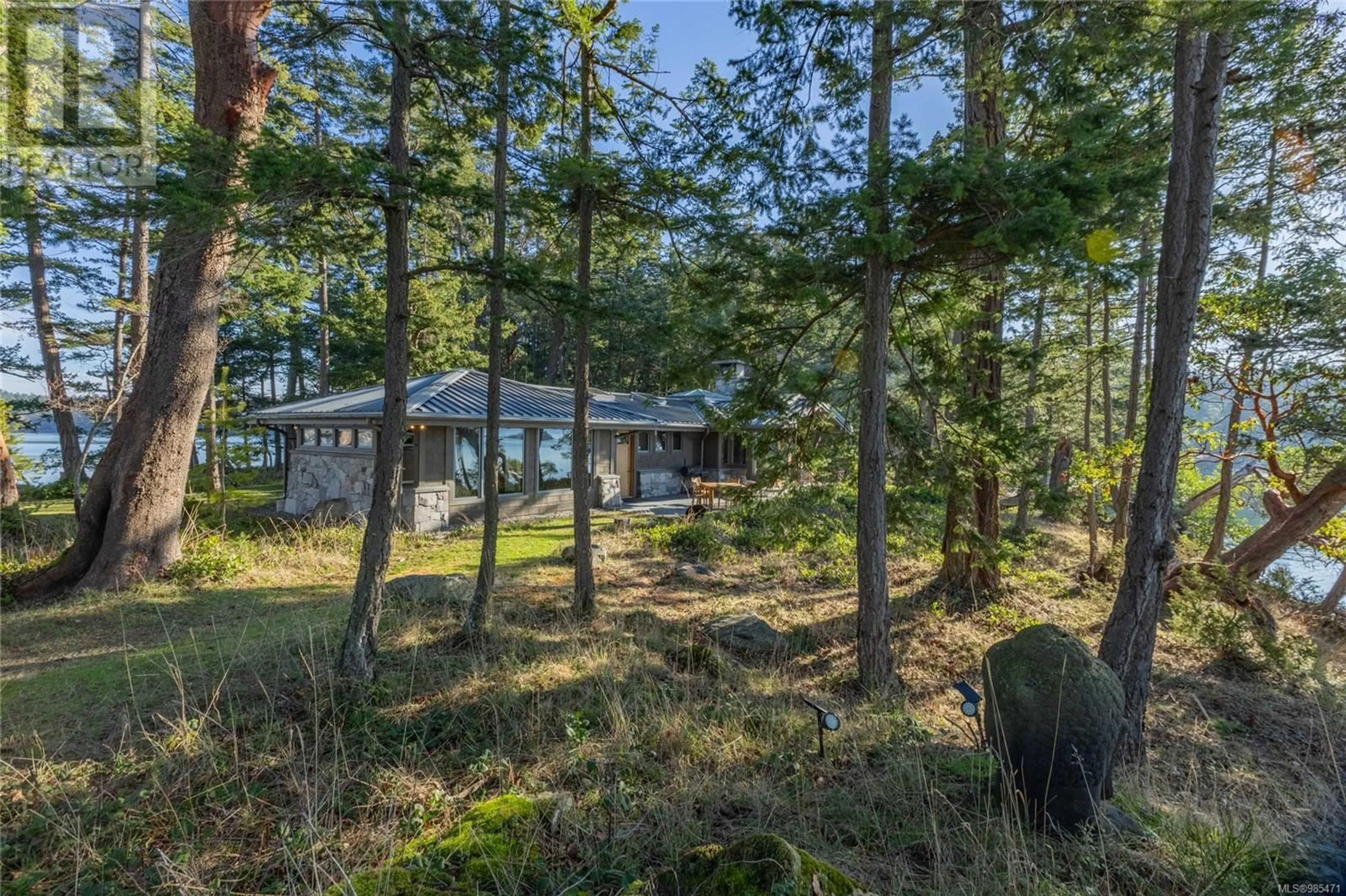 A pic from outside/outdoor area/front of a property/back of a property/a pic from drone, forest/trees view for 105 Church Bay Rd, Saturna Island British Columbia V0N2Y0