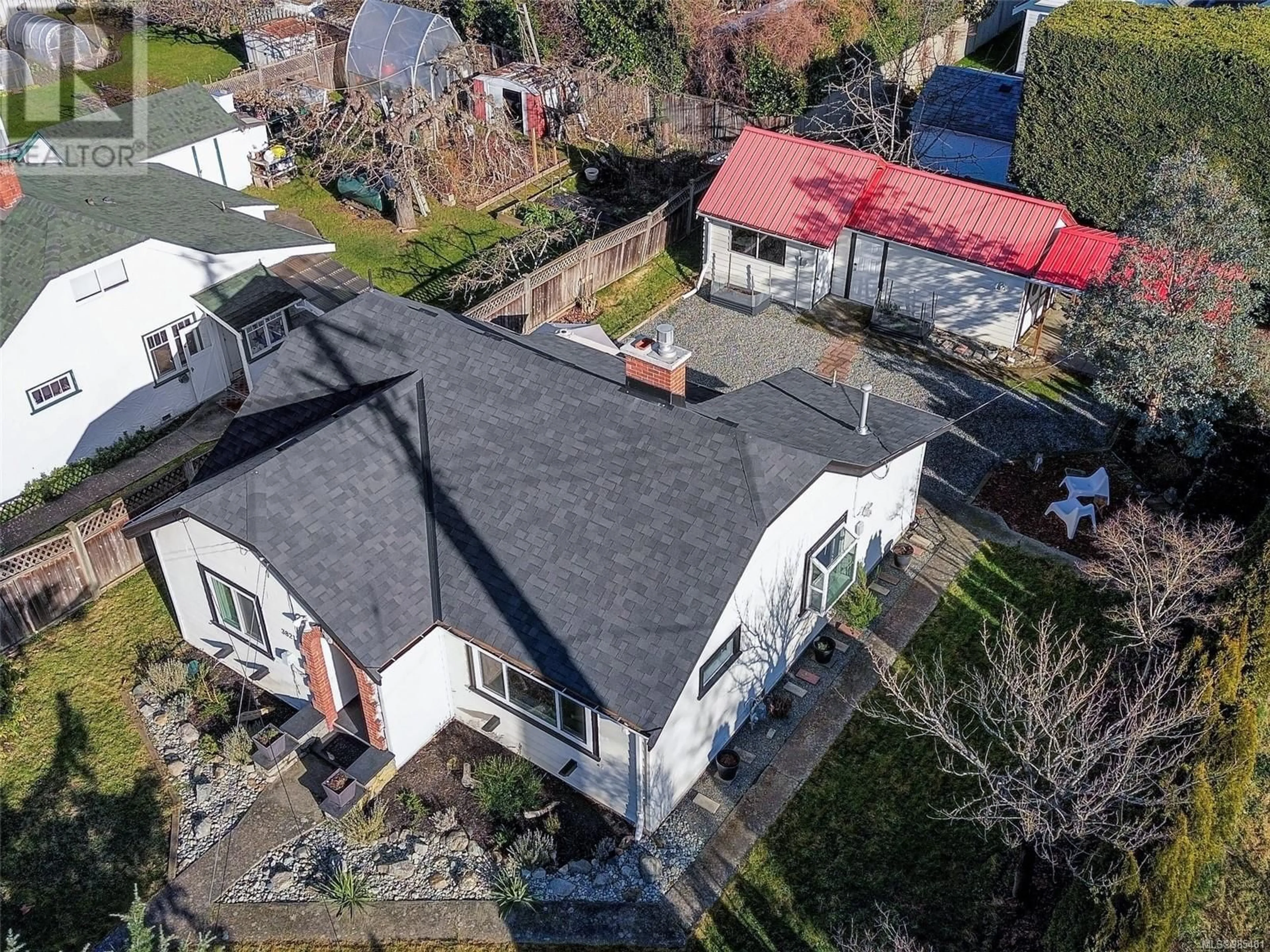 A pic from outside/outdoor area/front of a property/back of a property/a pic from drone, street for 3821 Carey Rd, Saanich British Columbia V8Z4C6