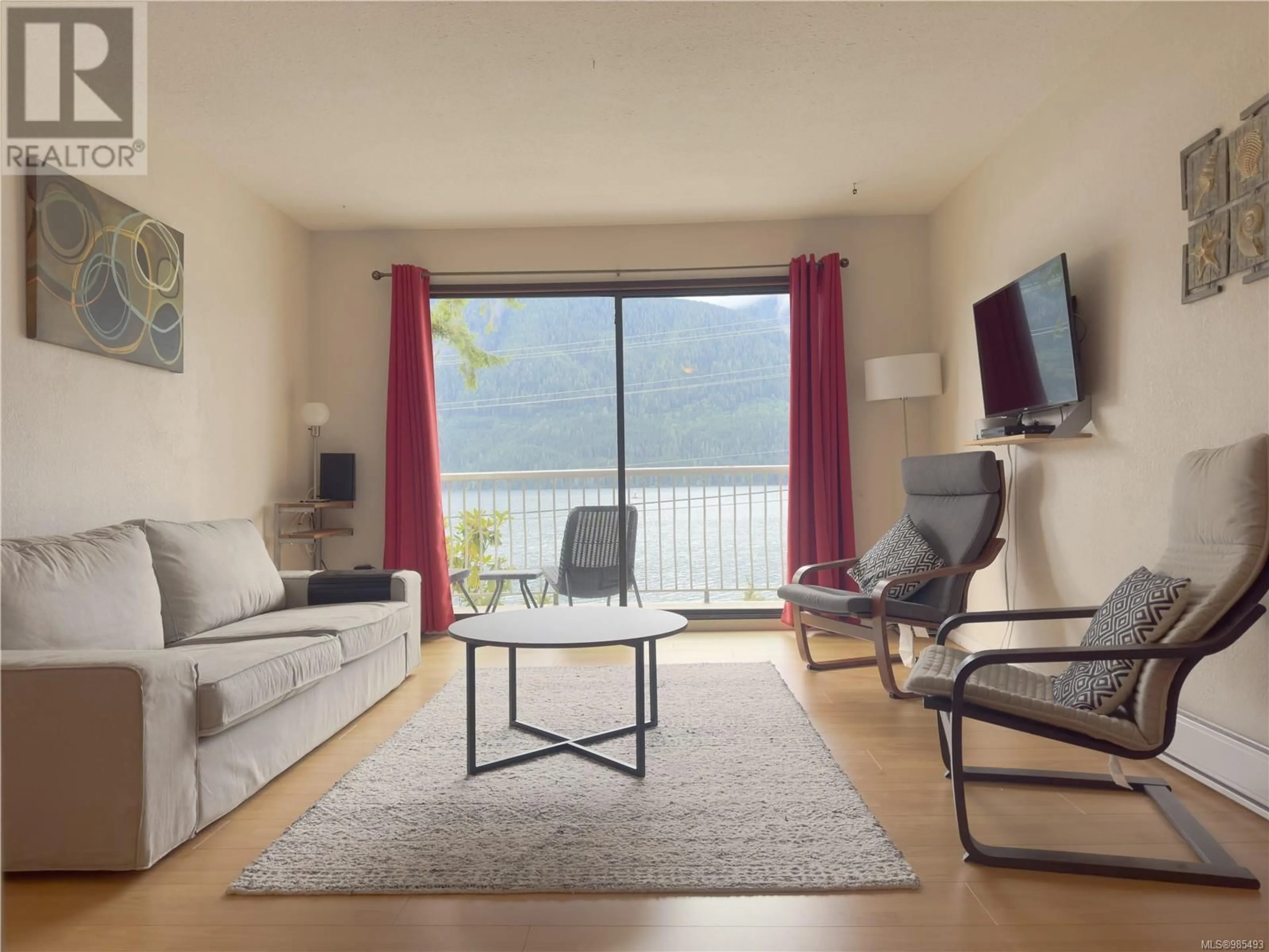 Living room with furniture, unknown for 206 791 Marine Dr, Port Alice British Columbia V0N2N0