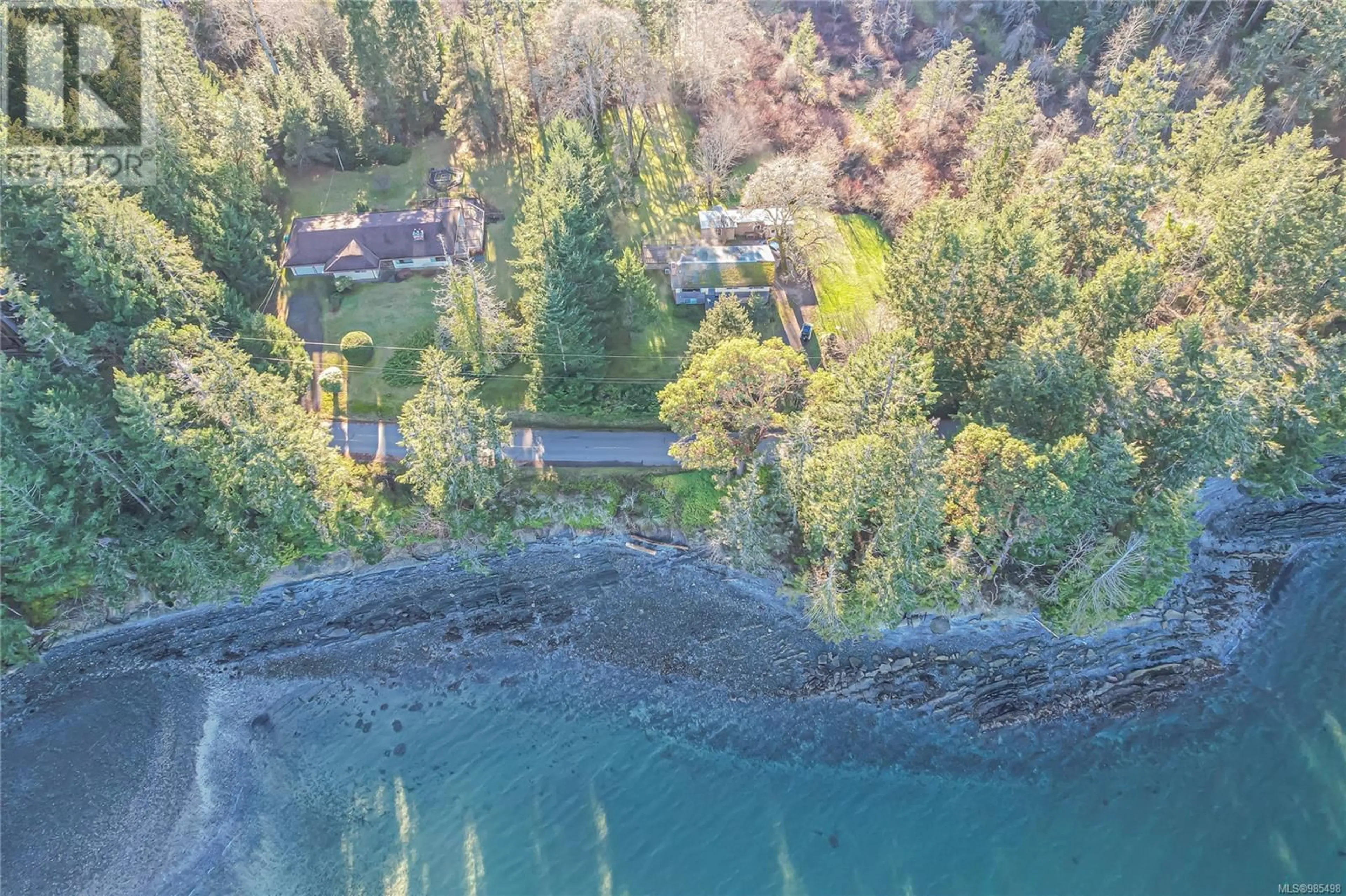 A pic from outside/outdoor area/front of a property/back of a property/a pic from drone, water/lake/river/ocean view for 1520 North Beach Rd, Salt Spring British Columbia V8K1A8