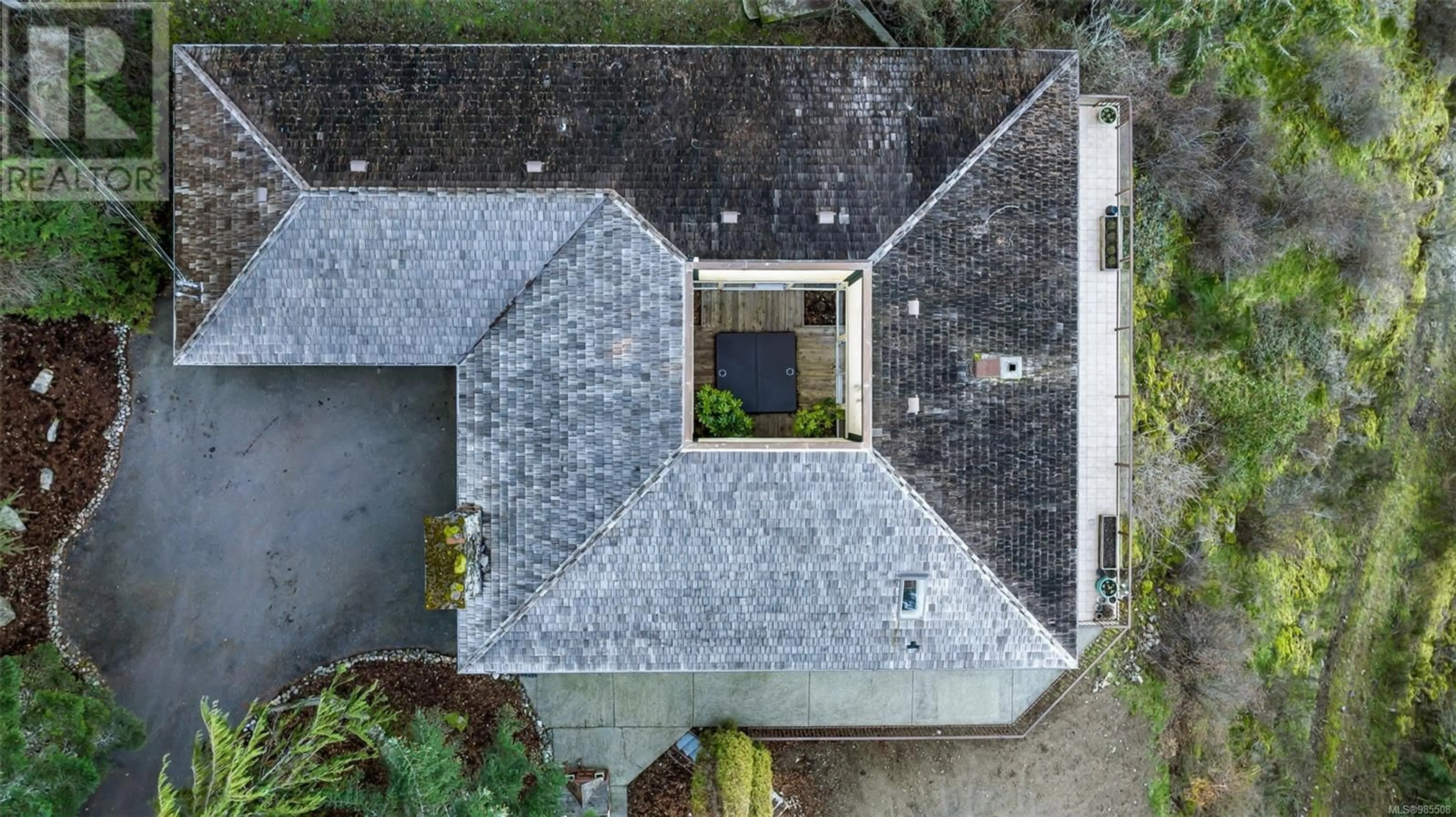 A pic from outside/outdoor area/front of a property/back of a property/a pic from drone, building for 4133 Rocky Mountain Rd, Malahat British Columbia V0R2L0