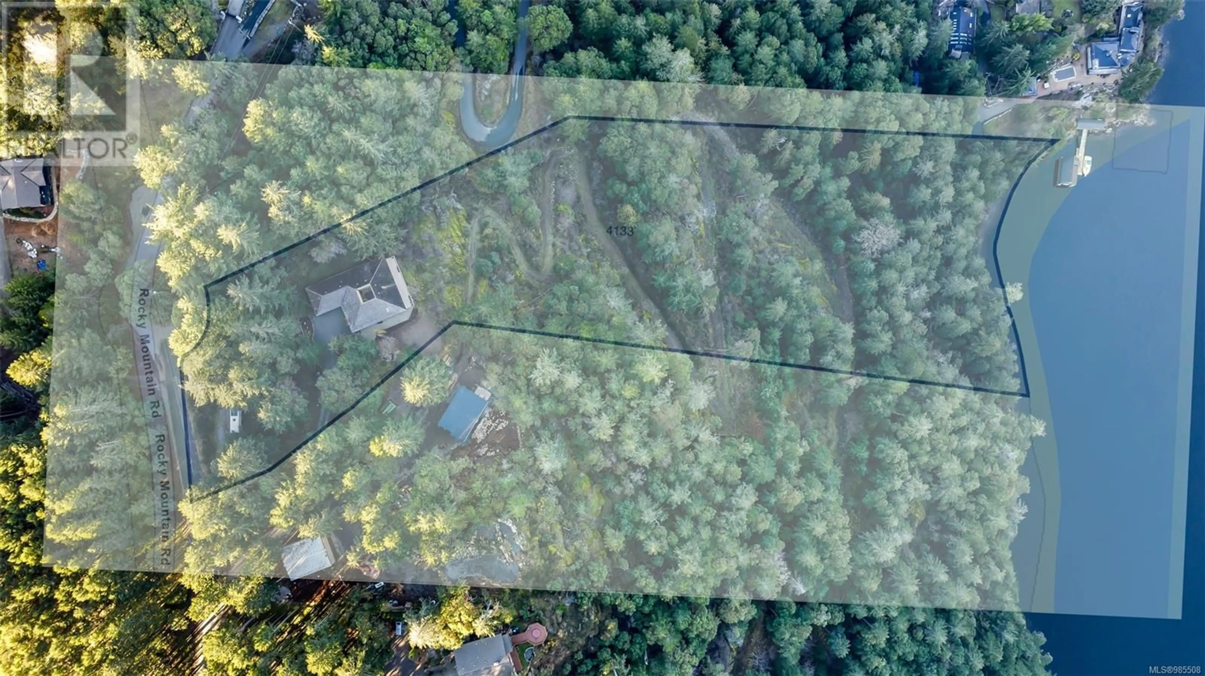 A pic from outside/outdoor area/front of a property/back of a property/a pic from drone, forest/trees view for 4133 Rocky Mountain Rd, Malahat British Columbia V0R2L0