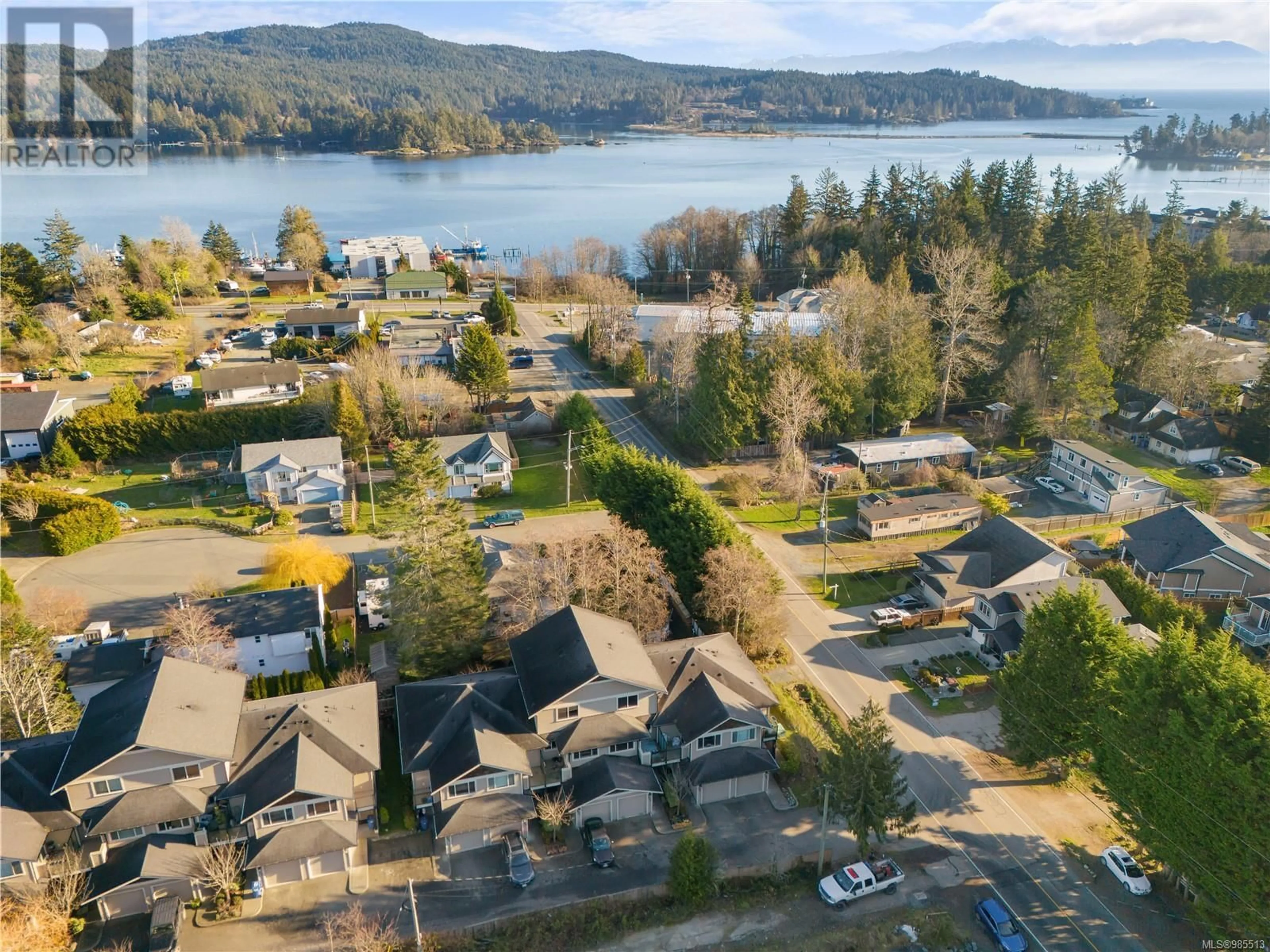 A pic from outside/outdoor area/front of a property/back of a property/a pic from drone, water/lake/river/ocean view for 102 1919 Maple Ave S, Sooke British Columbia V9Z1L5