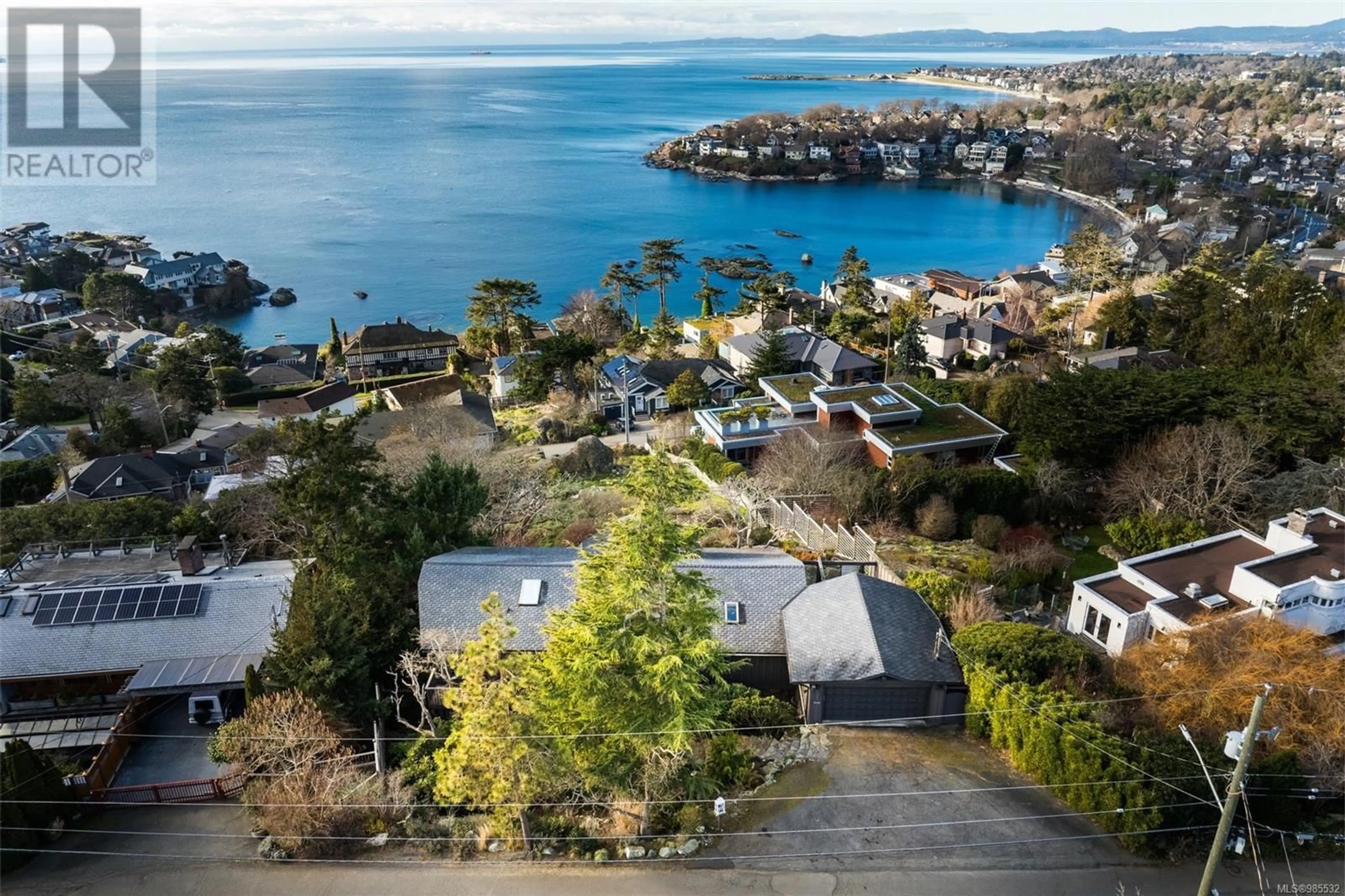 A pic from outside/outdoor area/front of a property/back of a property/a pic from drone, water/lake/river/ocean view for 202 Denison Rd, Oak Bay British Columbia V8S4K3