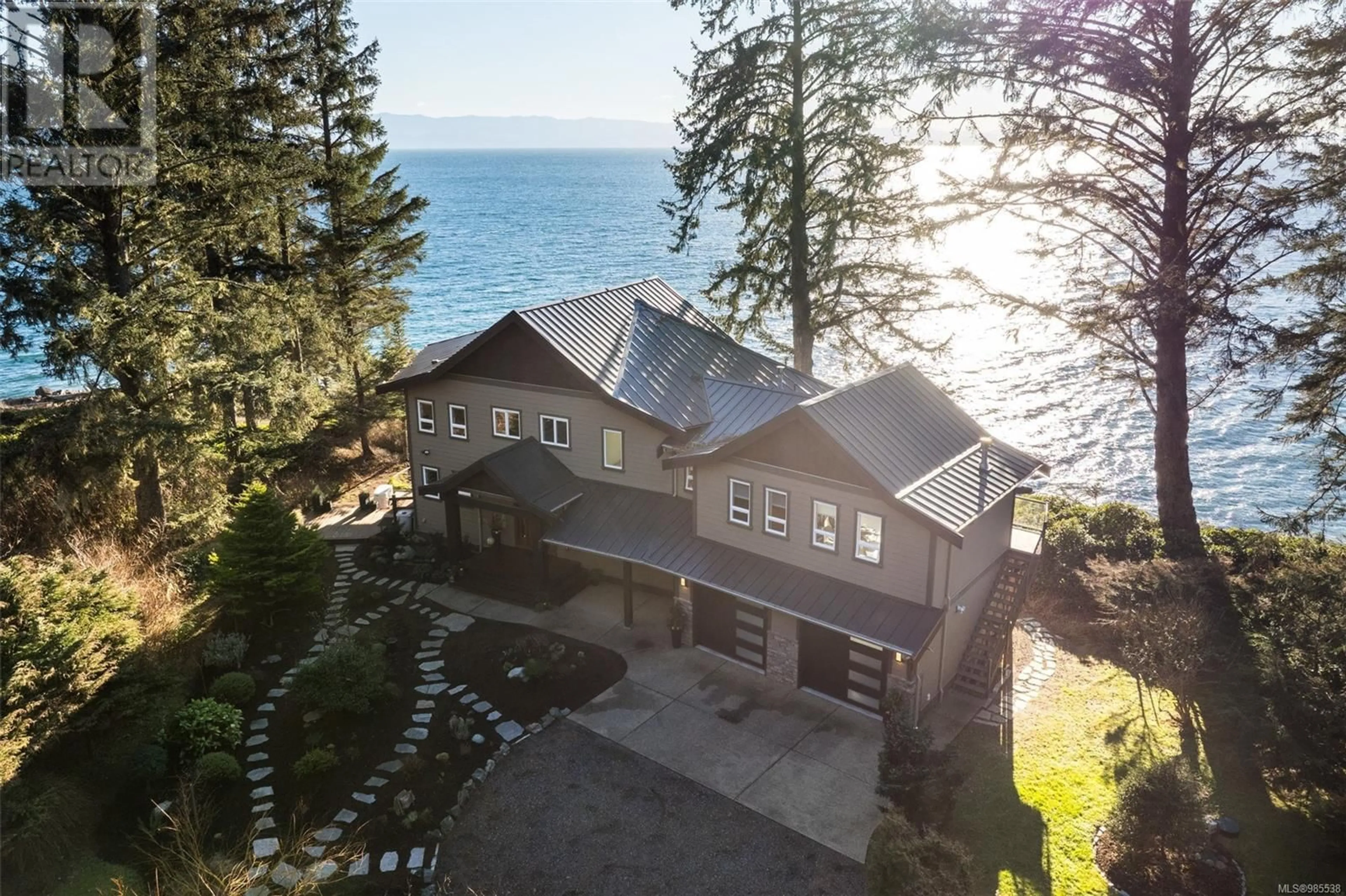 A pic from outside/outdoor area/front of a property/back of a property/a pic from drone, water/lake/river/ocean view for 2900 Fishboat Bay Rd, Sooke British Columbia V9Z1G9