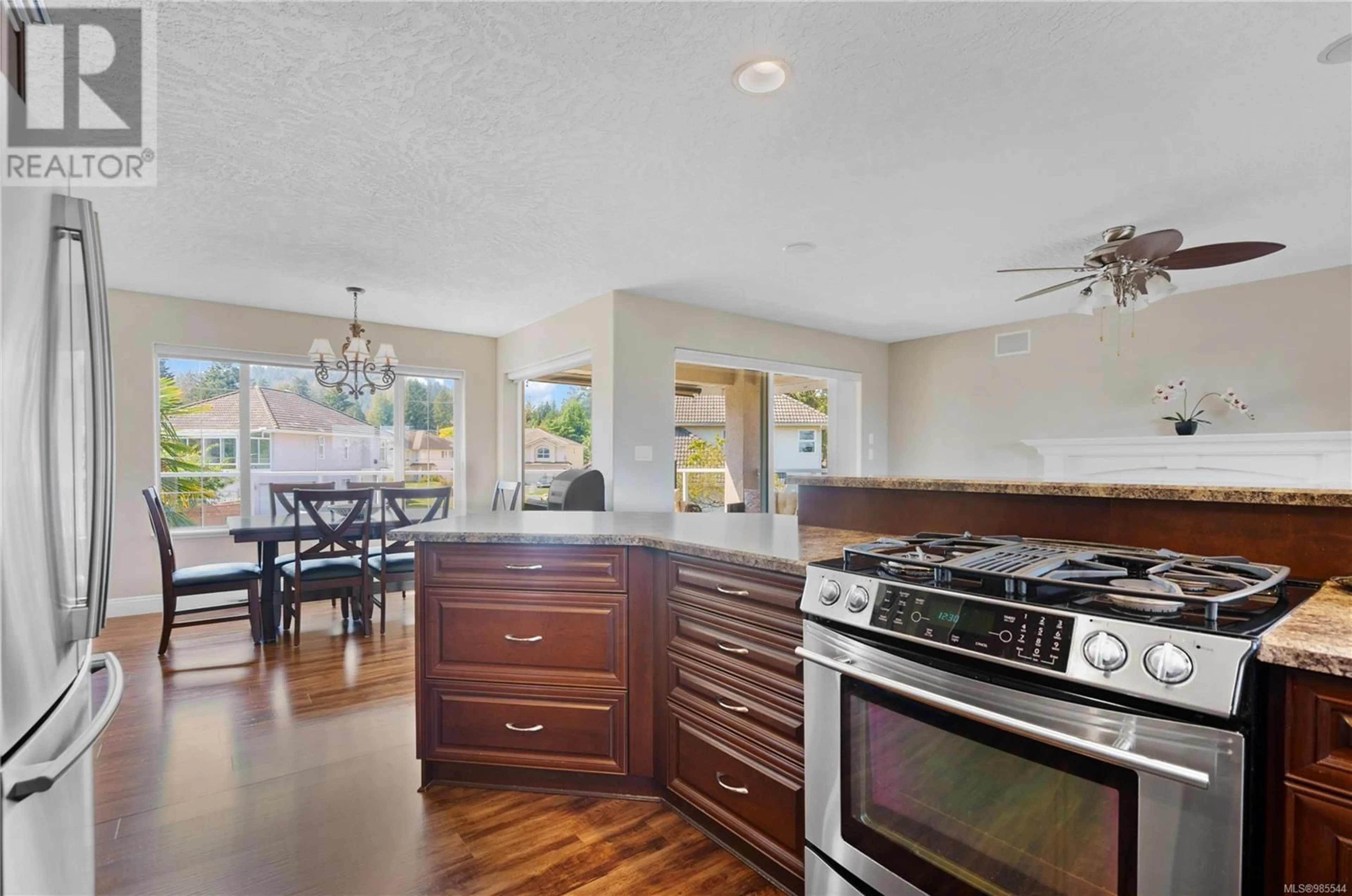 Open concept kitchen, ceramic/tile floor for 6255 Karen Crt, Central Saanich British Columbia V8Z7K7