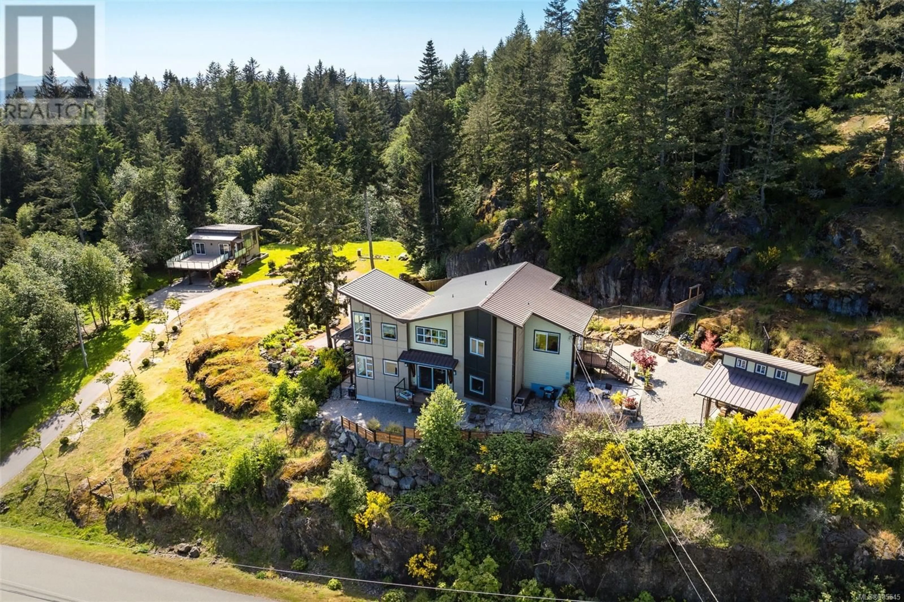 A pic from outside/outdoor area/front of a property/back of a property/a pic from drone, water/lake/river/ocean view for 2183 Otter Ridge Dr, Sooke British Columbia V9Z1E4