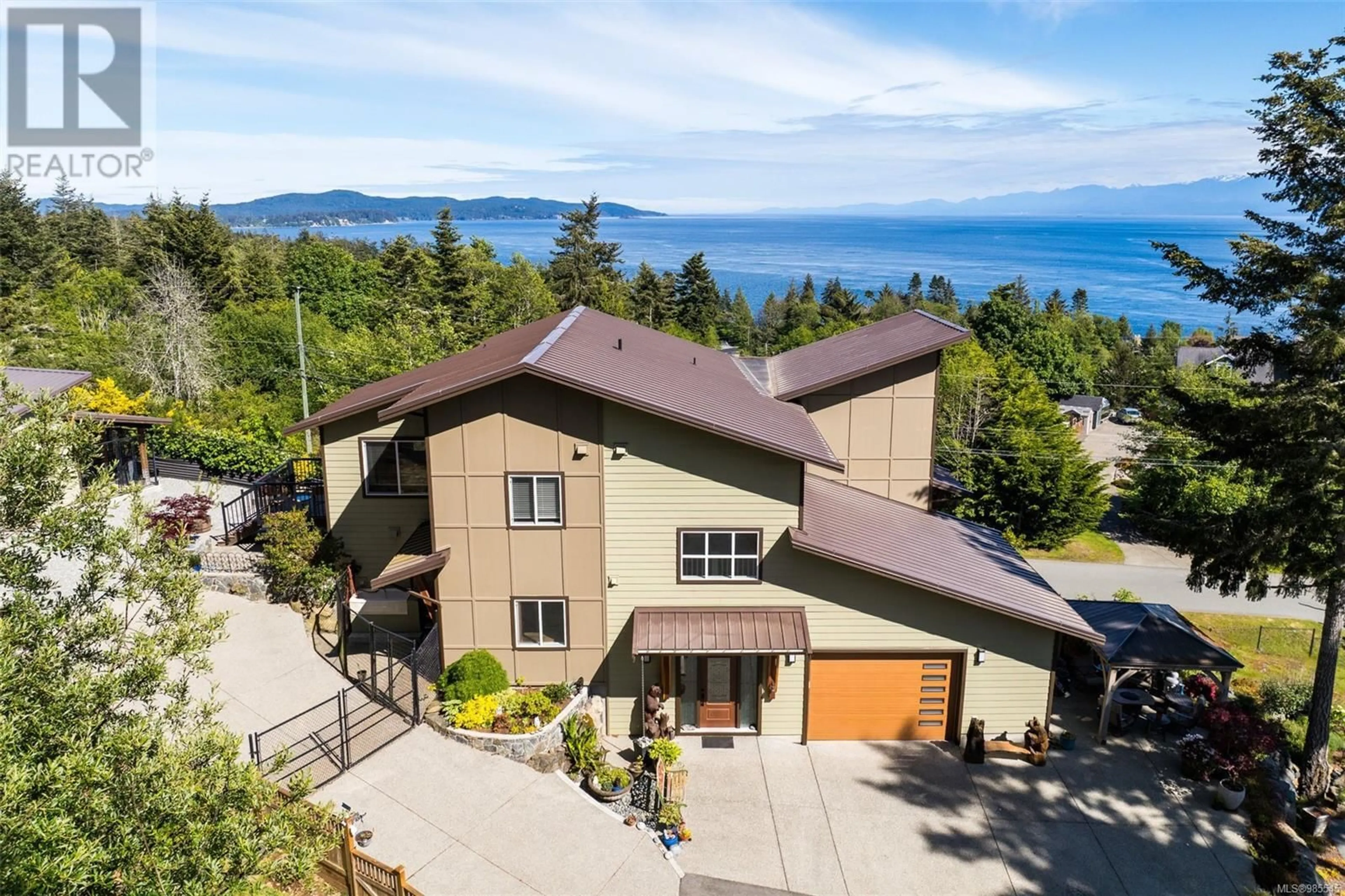 A pic from outside/outdoor area/front of a property/back of a property/a pic from drone, water/lake/river/ocean view for 2183 Otter Ridge Dr, Sooke British Columbia V9Z1E4