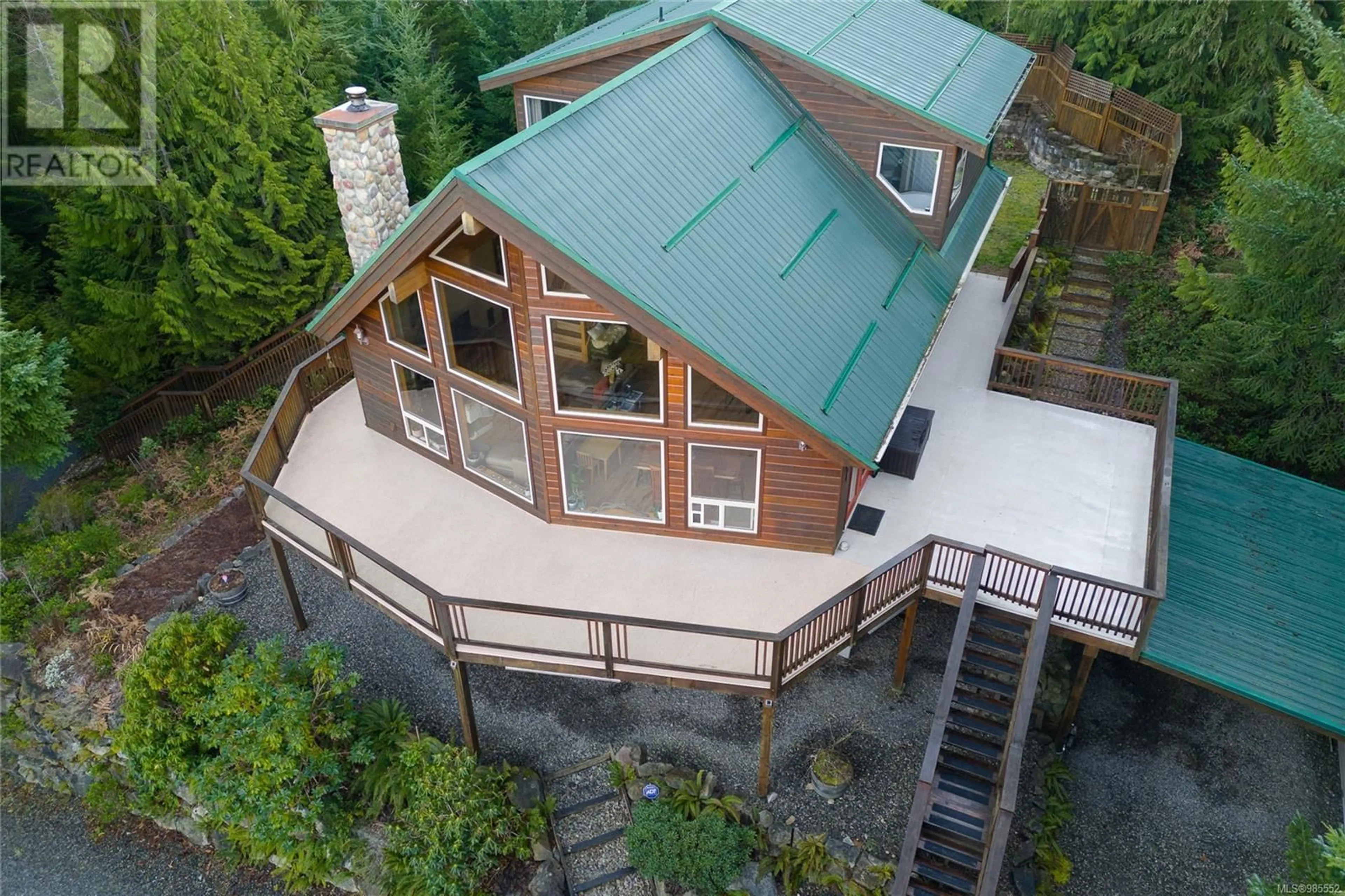 A pic from outside/outdoor area/front of a property/back of a property/a pic from drone, mountain view for 1556 Meadowood Way, Qualicum Beach British Columbia V9K2V2