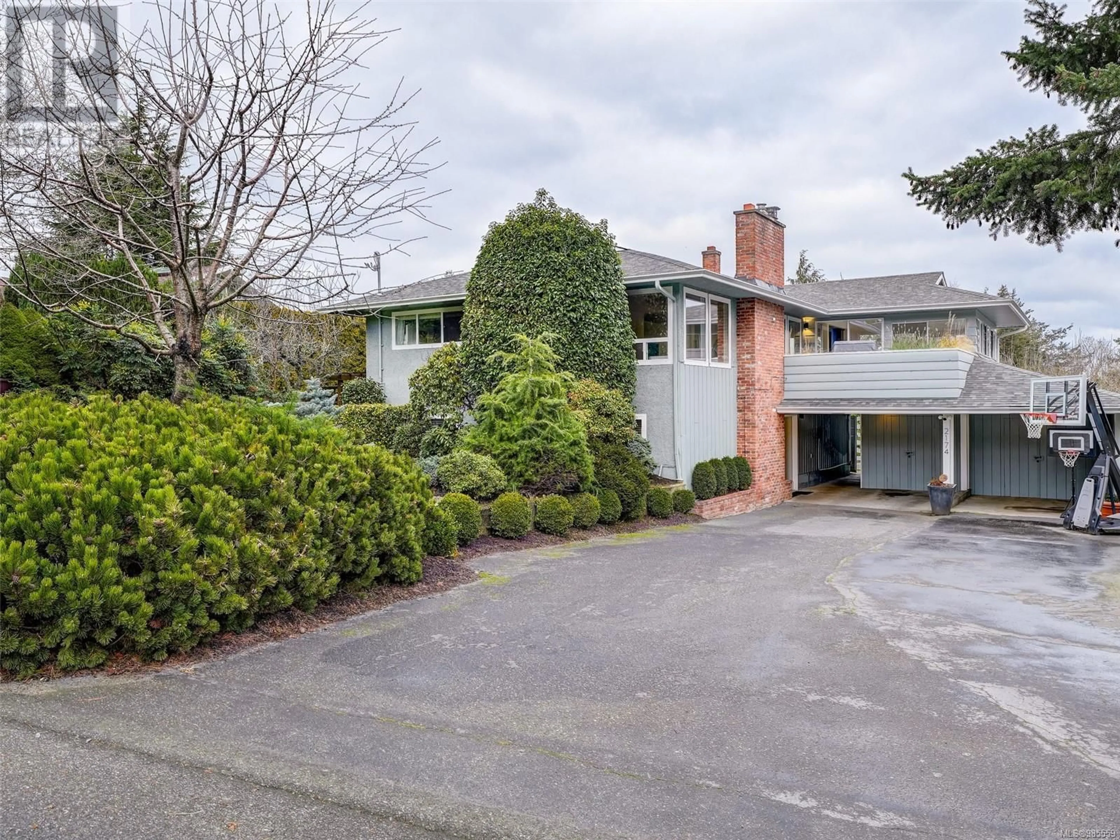 A pic from outside/outdoor area/front of a property/back of a property/a pic from drone, street for 2174 Wenman Dr, Saanich British Columbia V8N2S2