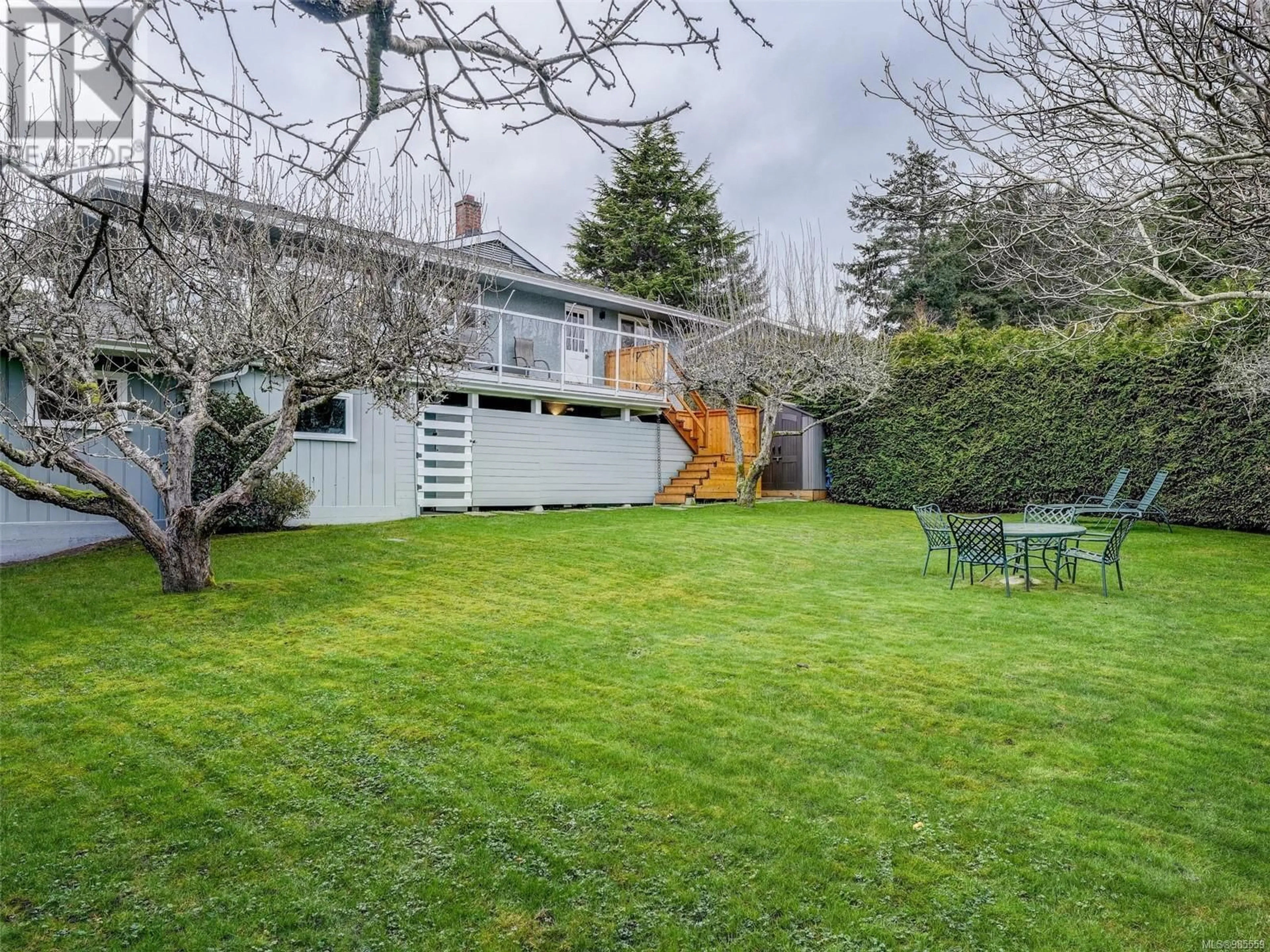 A pic from outside/outdoor area/front of a property/back of a property/a pic from drone, street for 2174 Wenman Dr, Saanich British Columbia V8N2S2