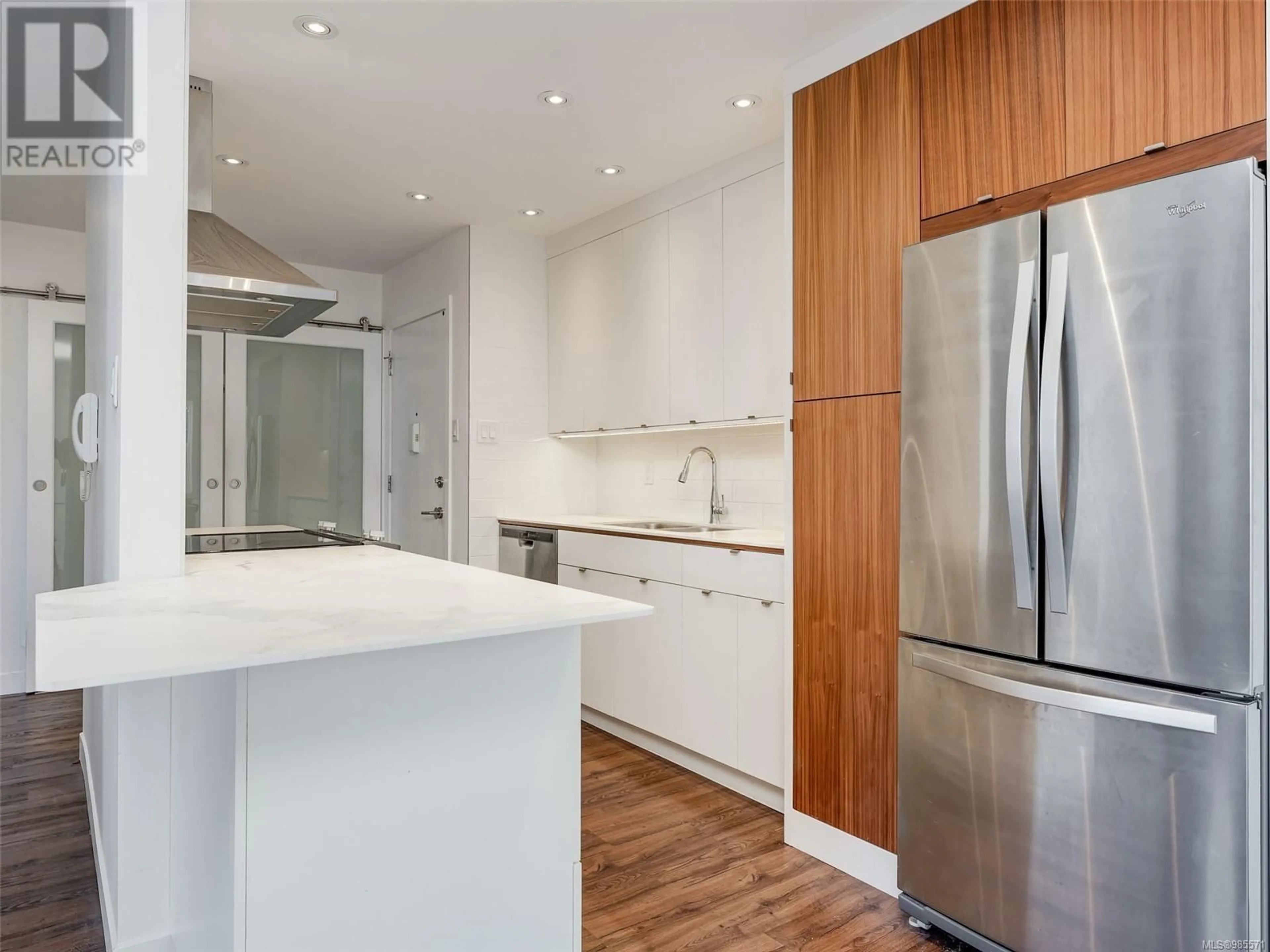 Contemporary kitchen, wood/laminate floor for 202 1012 Pakington St, Victoria British Columbia V8V3A1