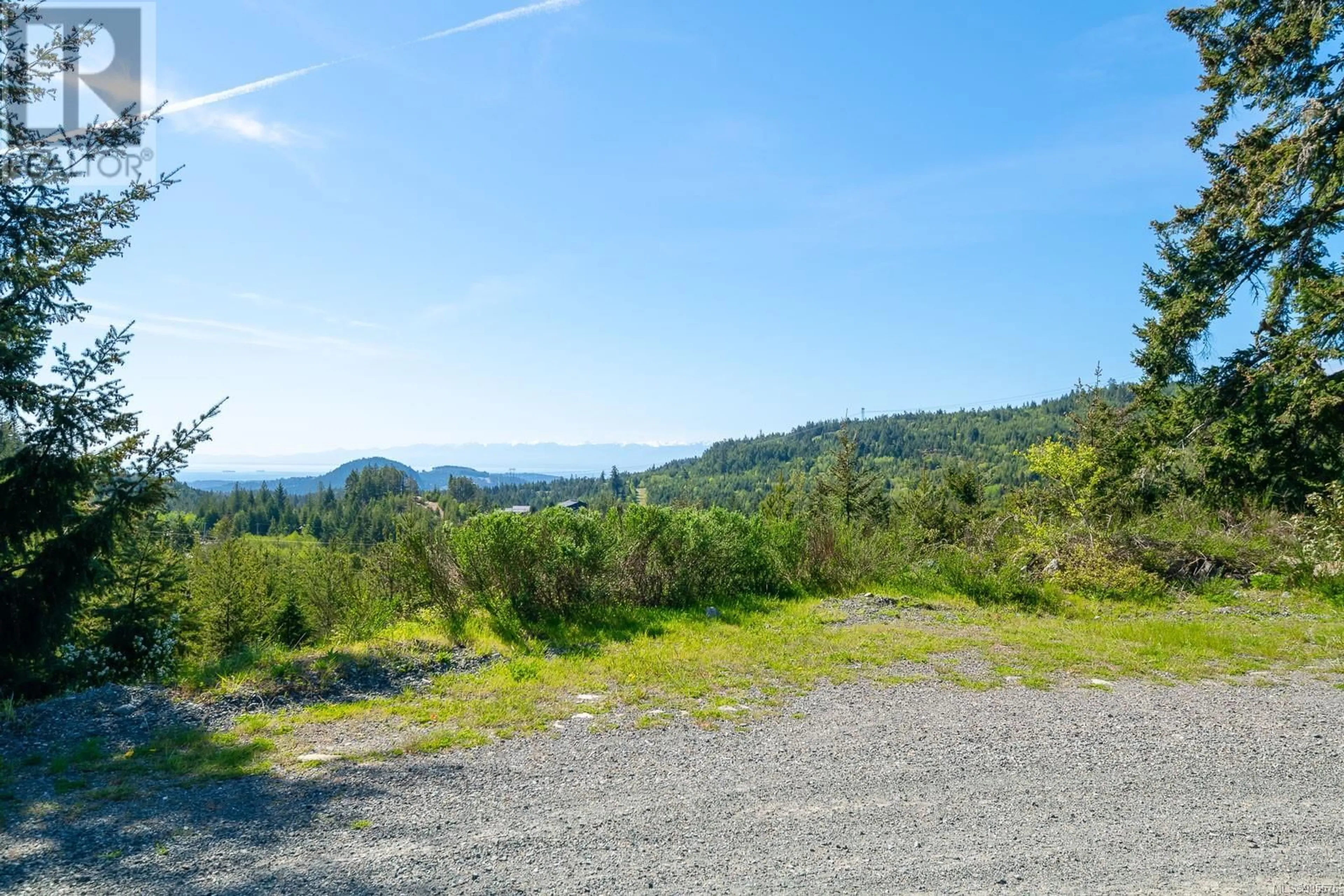 A pic from outside/outdoor area/front of a property/back of a property/a pic from drone, mountain view for 4270 Goldstream Heights Dr, Shawnigan Lake British Columbia V0R2W3