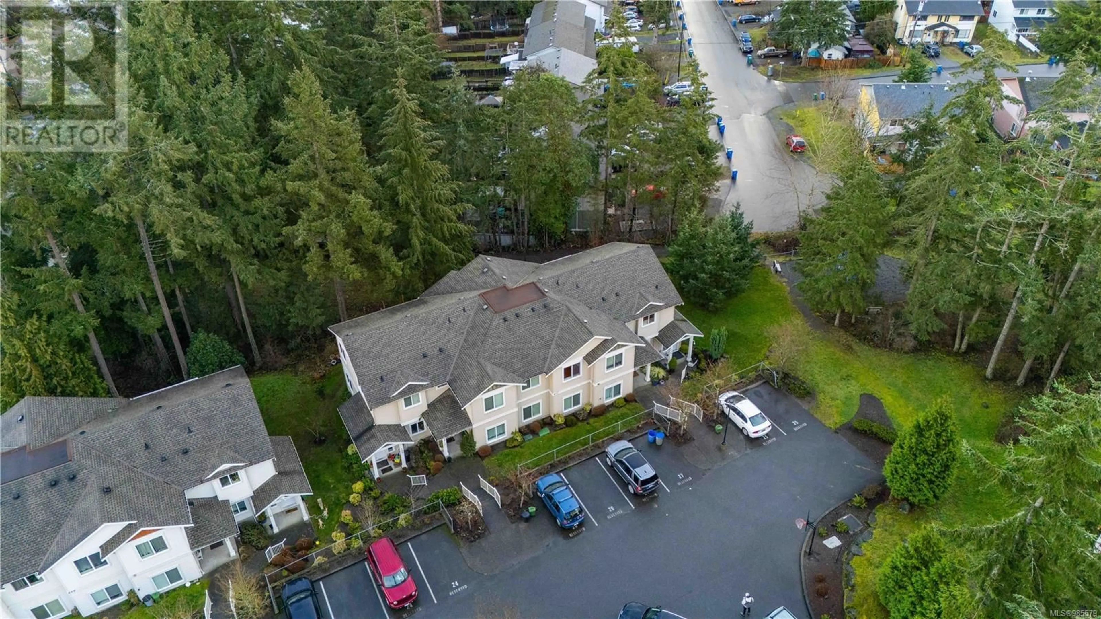 A pic from outside/outdoor area/front of a property/back of a property/a pic from drone, unknown for 210 812 Oakhills Vista, Nanaimo British Columbia V9R0A3