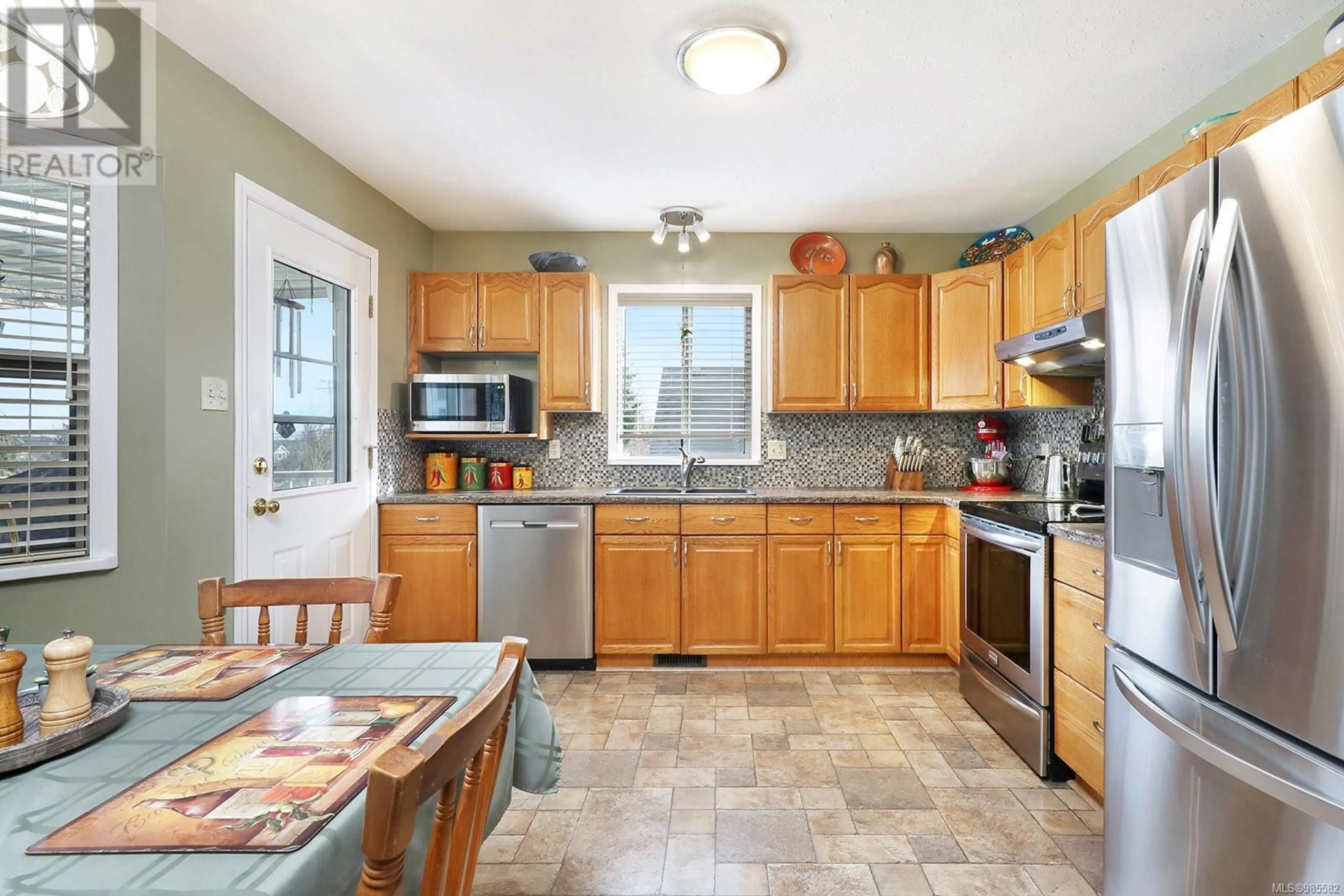 Standard kitchen, ceramic/tile floor for 2614 Calnan Cres, Cumberland British Columbia V0R1S0