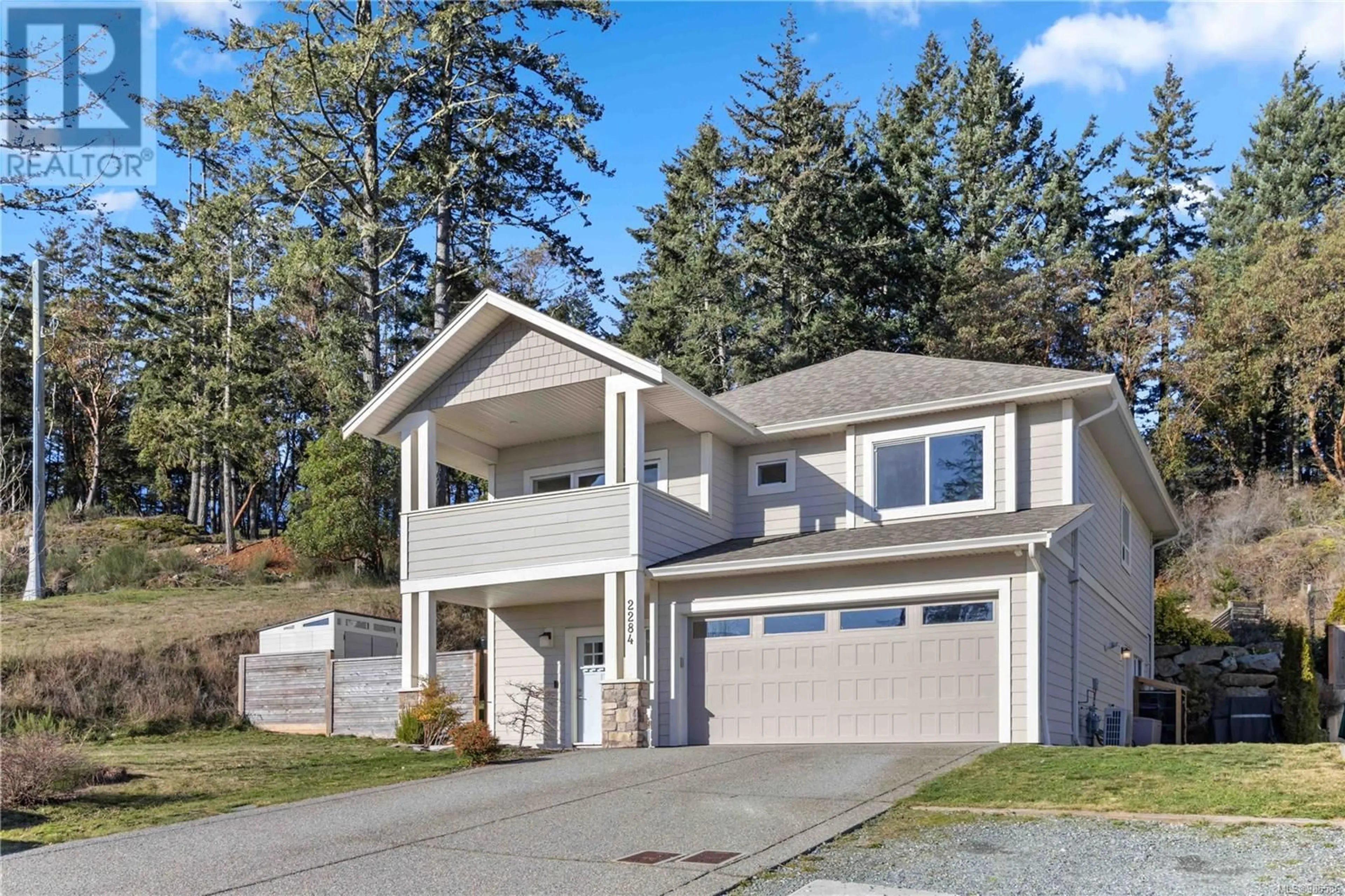 Home with vinyl exterior material, street for 2284 Mountain Heights Dr, Sooke British Columbia V9Z1M4