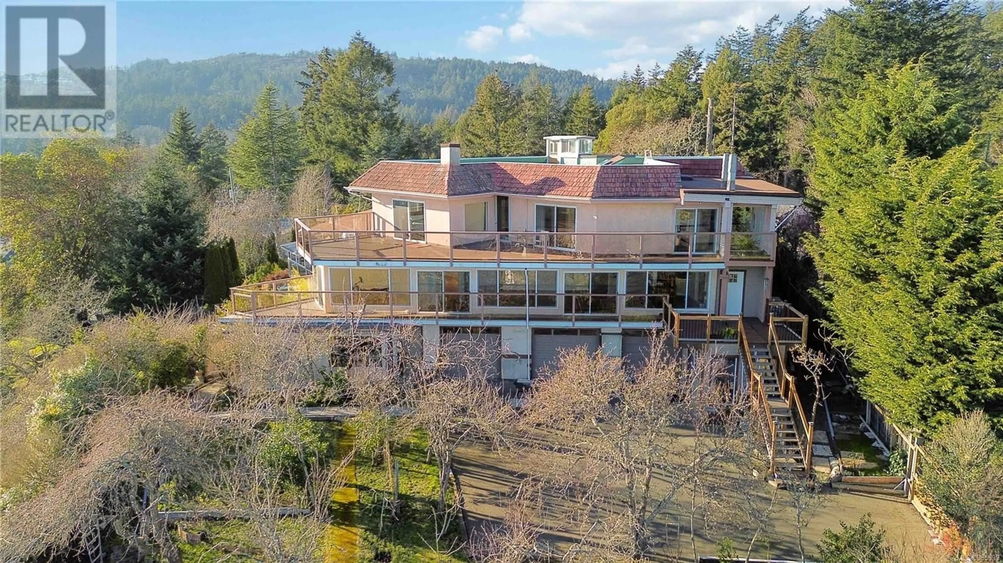 A pic from outside/outdoor area/front of a property/back of a property/a pic from drone, mountain view for 326 Damon Dr, View Royal British Columbia V9B5G5