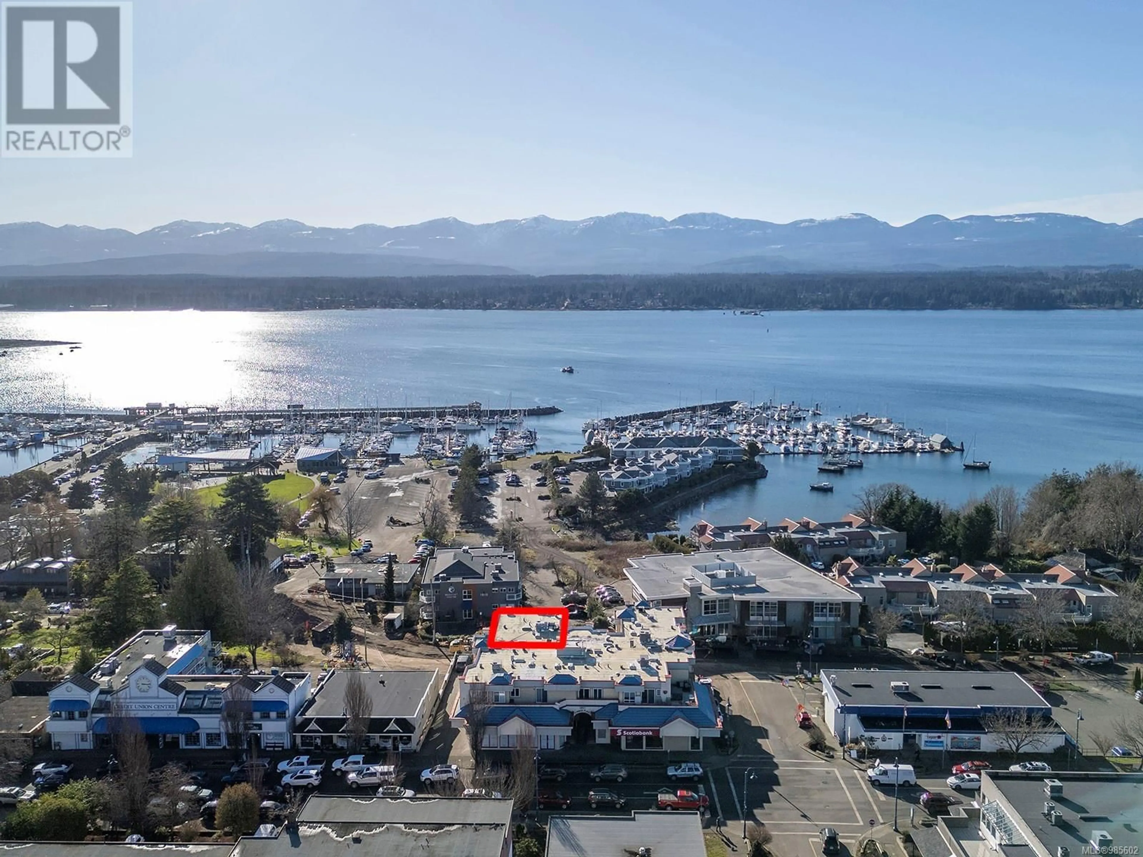 A pic from outside/outdoor area/front of a property/back of a property/a pic from drone, water/lake/river/ocean view for 303 1811 Comox Ave, Comox British Columbia V9M3L9