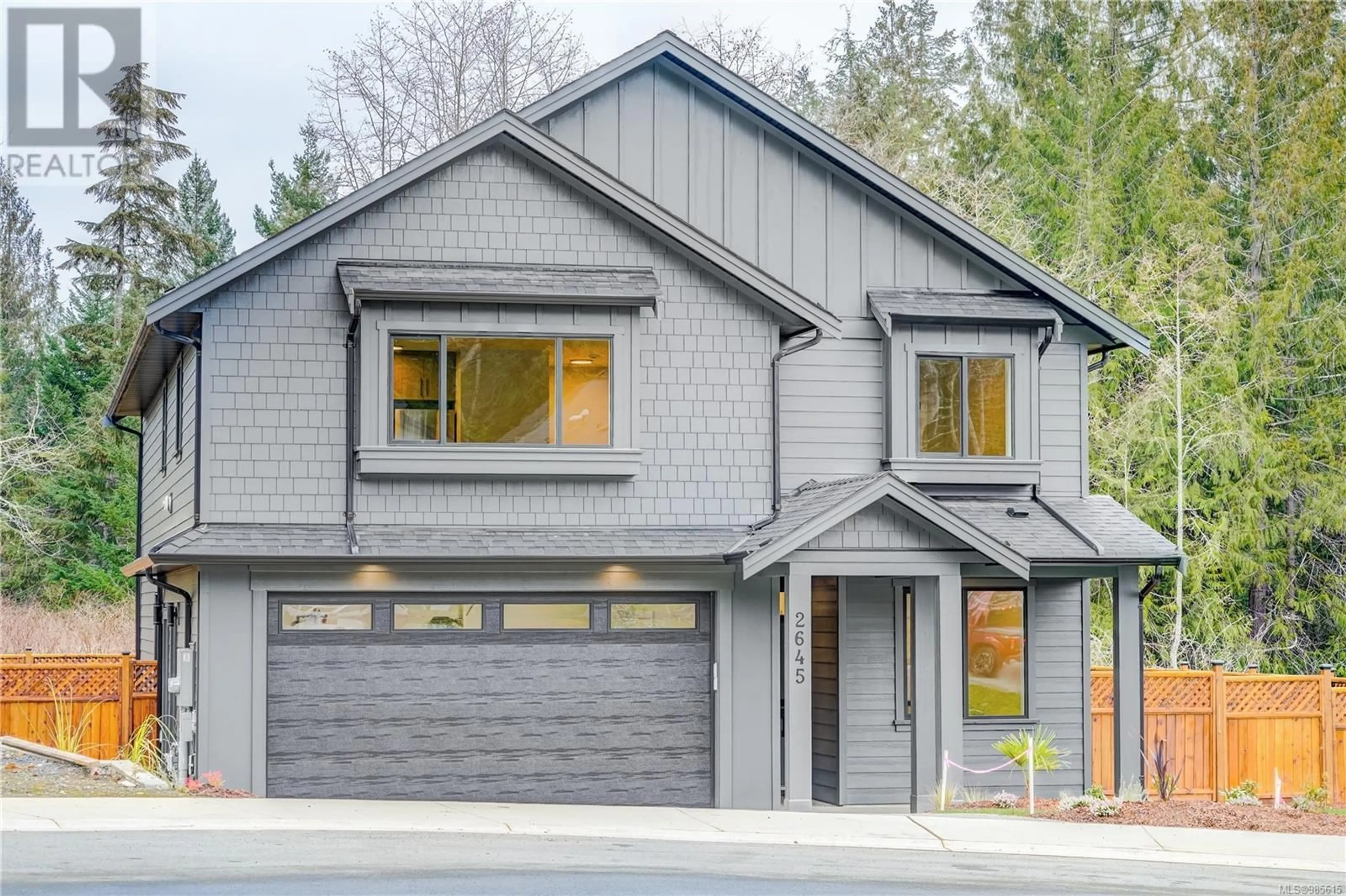 Home with vinyl exterior material, street for 2645 Forest Edge Rd, Sooke British Columbia V9Z1P9