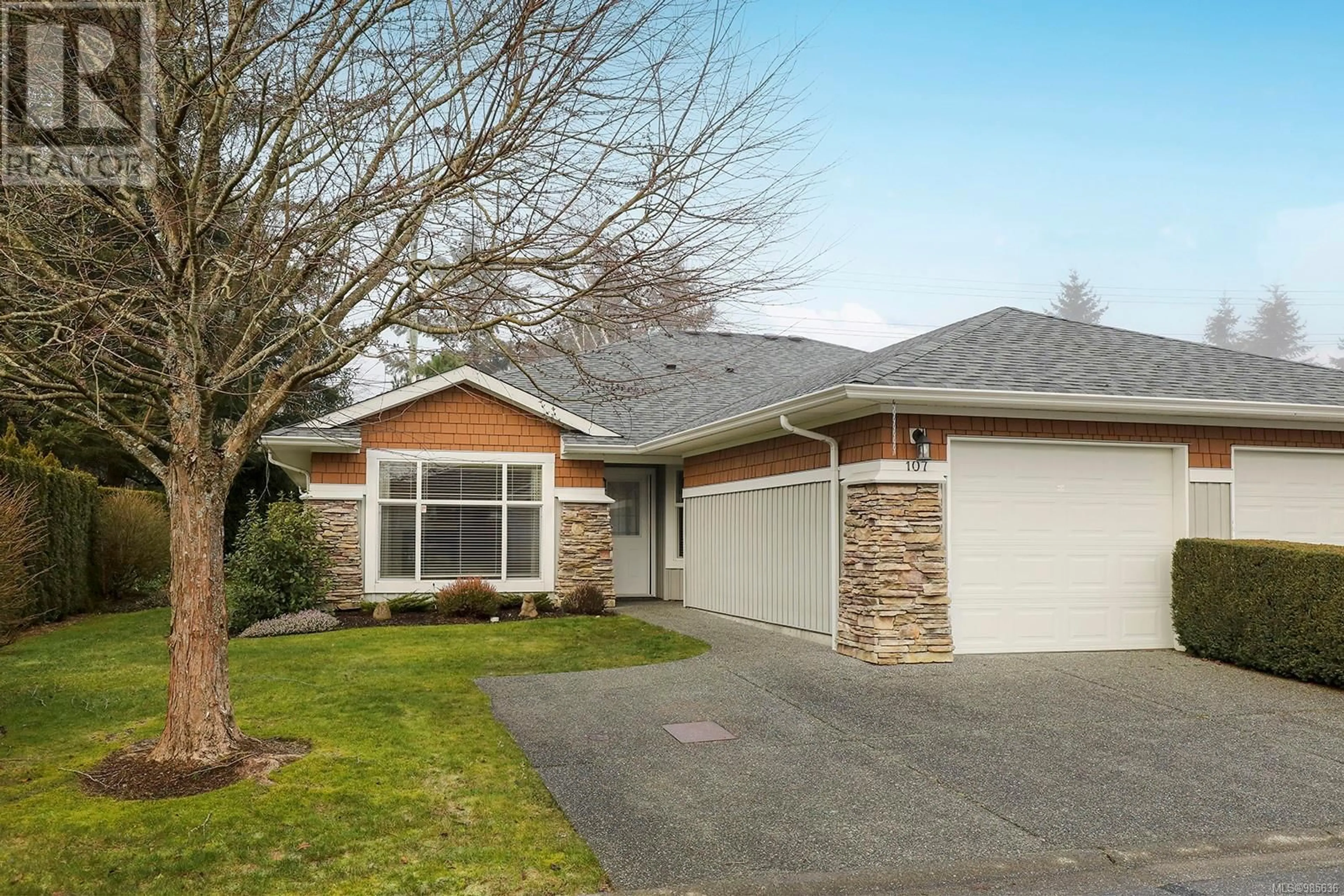 Home with vinyl exterior material, street for 107 1919 St. Andrews Pl, Courtenay British Columbia V9N9T4