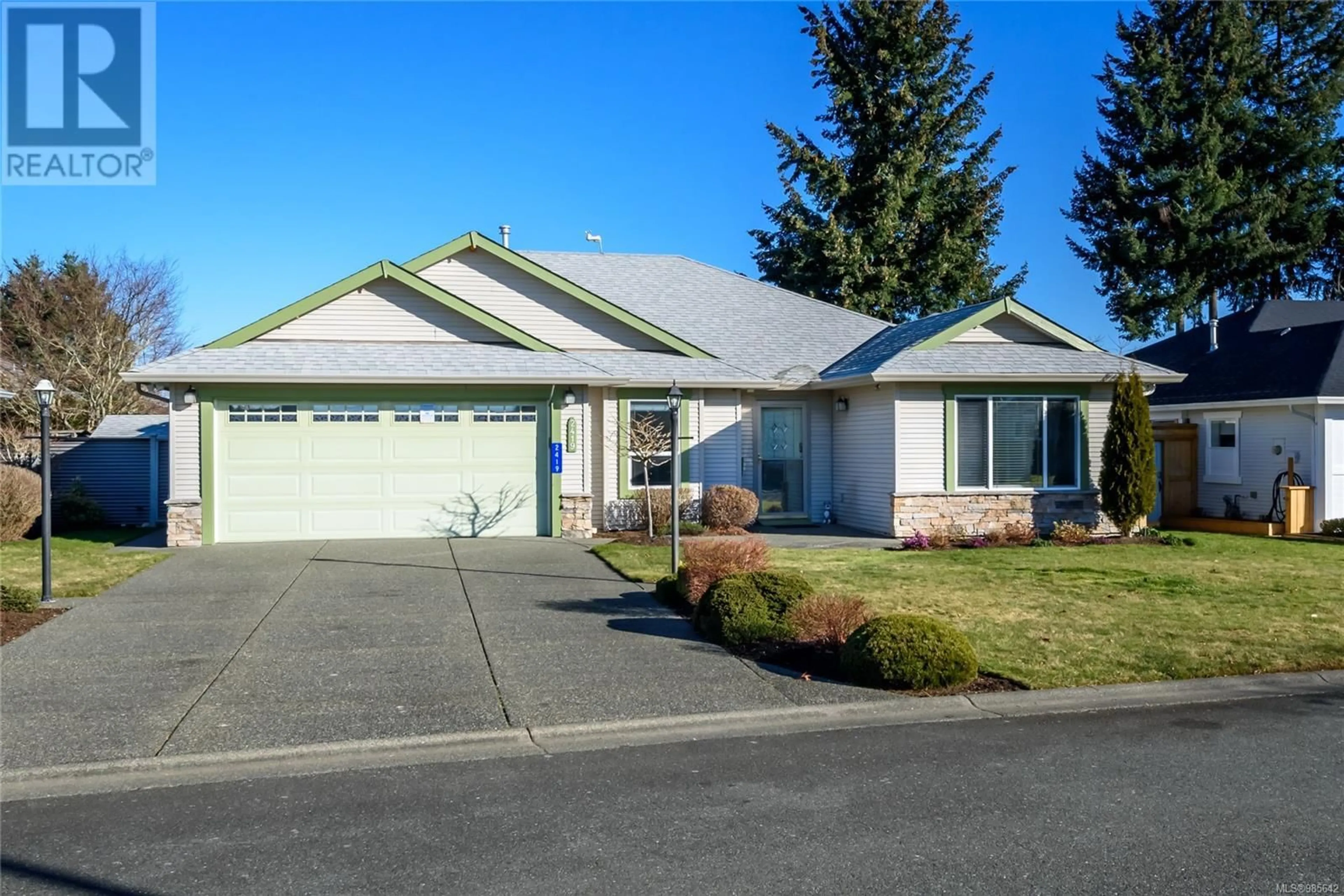 Home with vinyl exterior material, street for 2419 Lomond Pl, Courtenay British Columbia V9N9J3