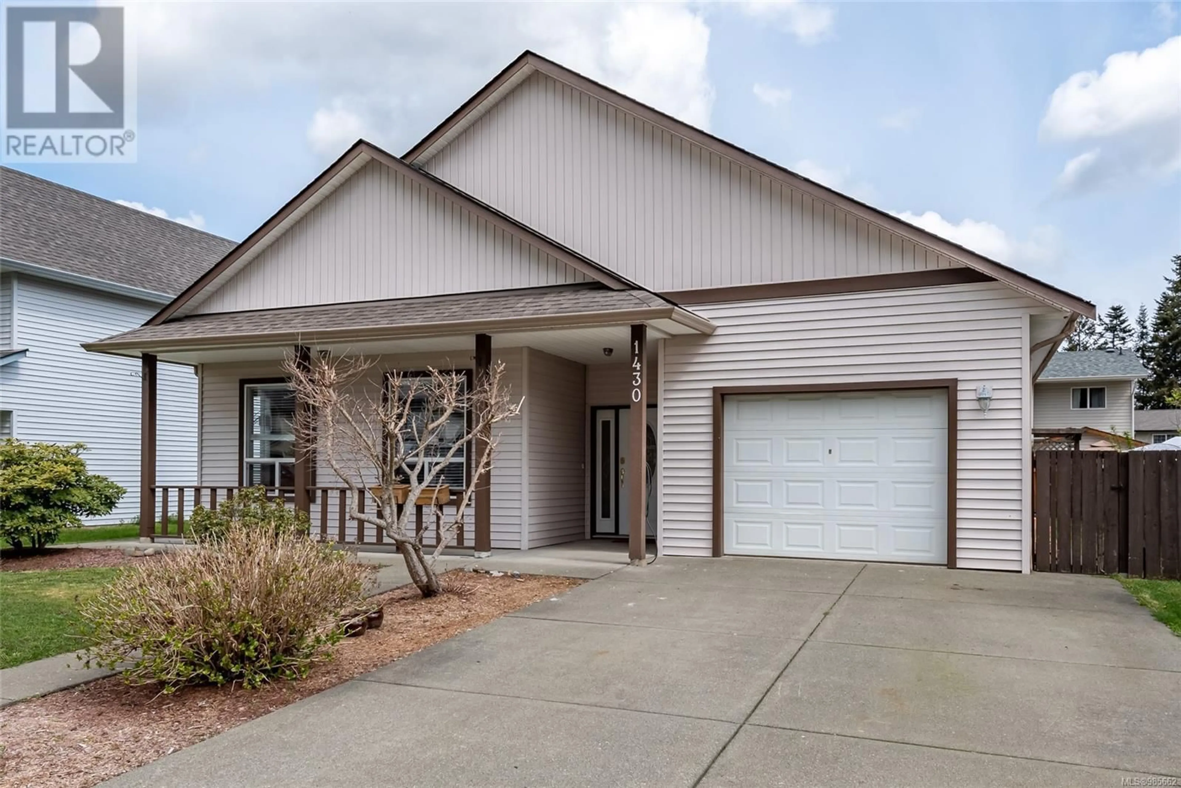 Home with vinyl exterior material, street for 1430 Krebs Cres, Courtenay British Columbia V9N9E9