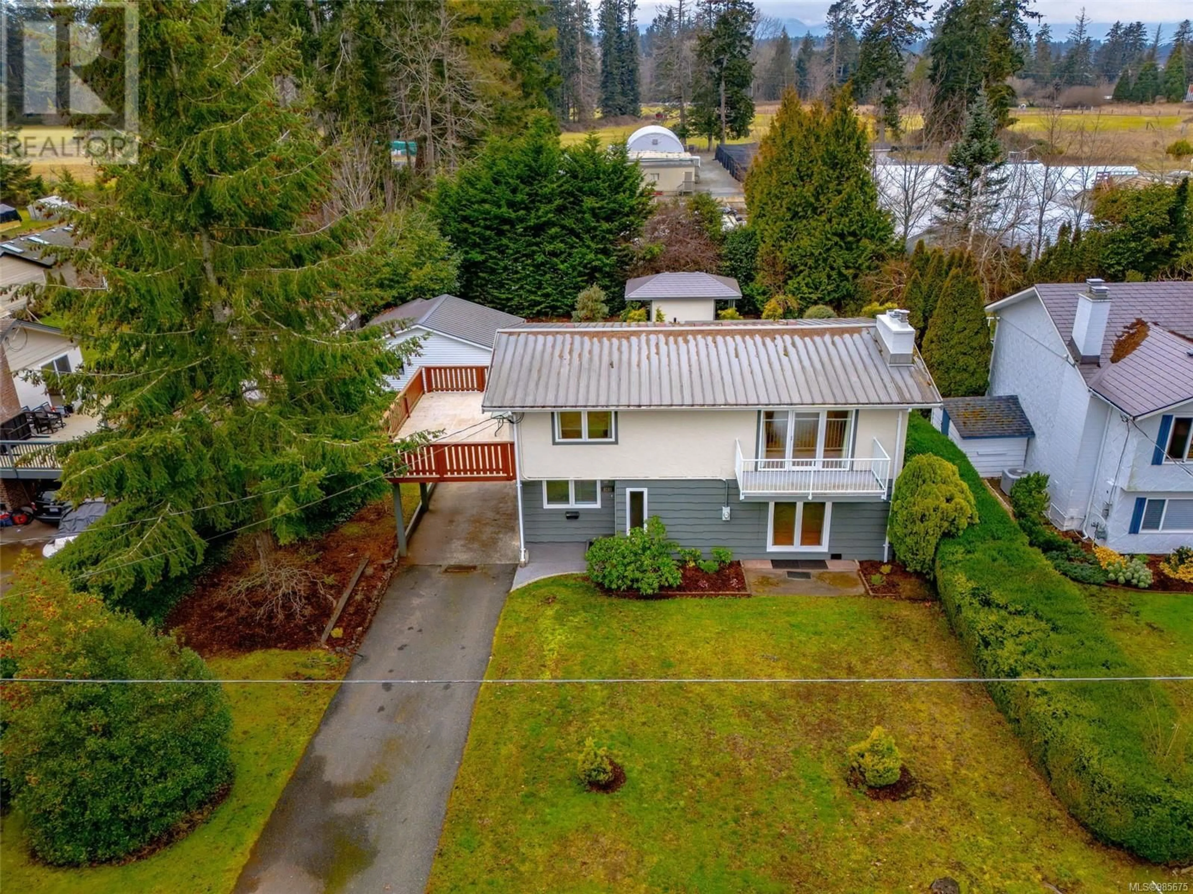 A pic from outside/outdoor area/front of a property/back of a property/a pic from drone, street for 4101 Gartley Point Rd, Courtenay British Columbia V9N9T2